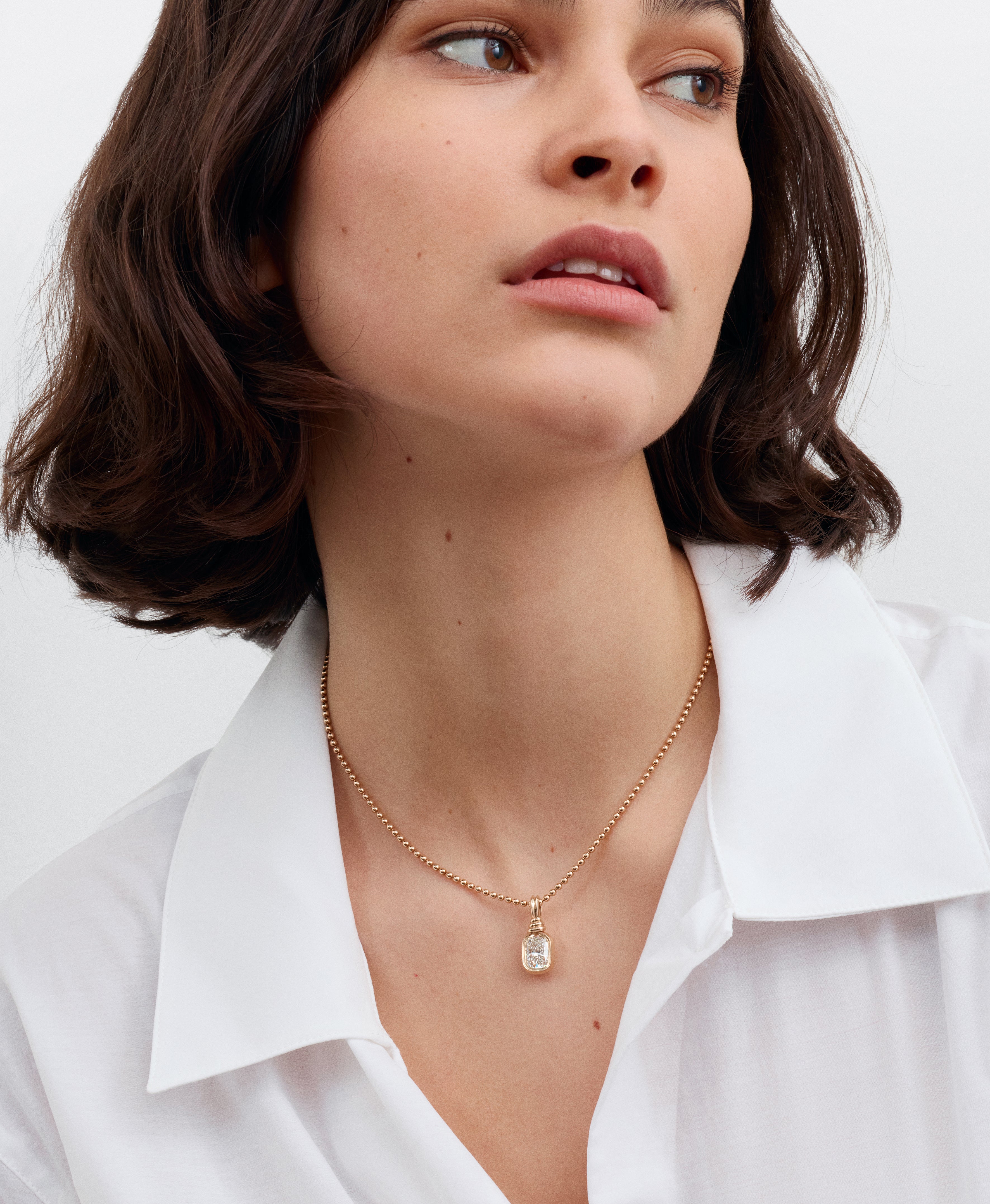 The Bound Pendant - Cushion Cut by East London jeweller Rachel Boston | Discover our collections of unique and timeless engagement rings, wedding rings, and modern fine jewellery.