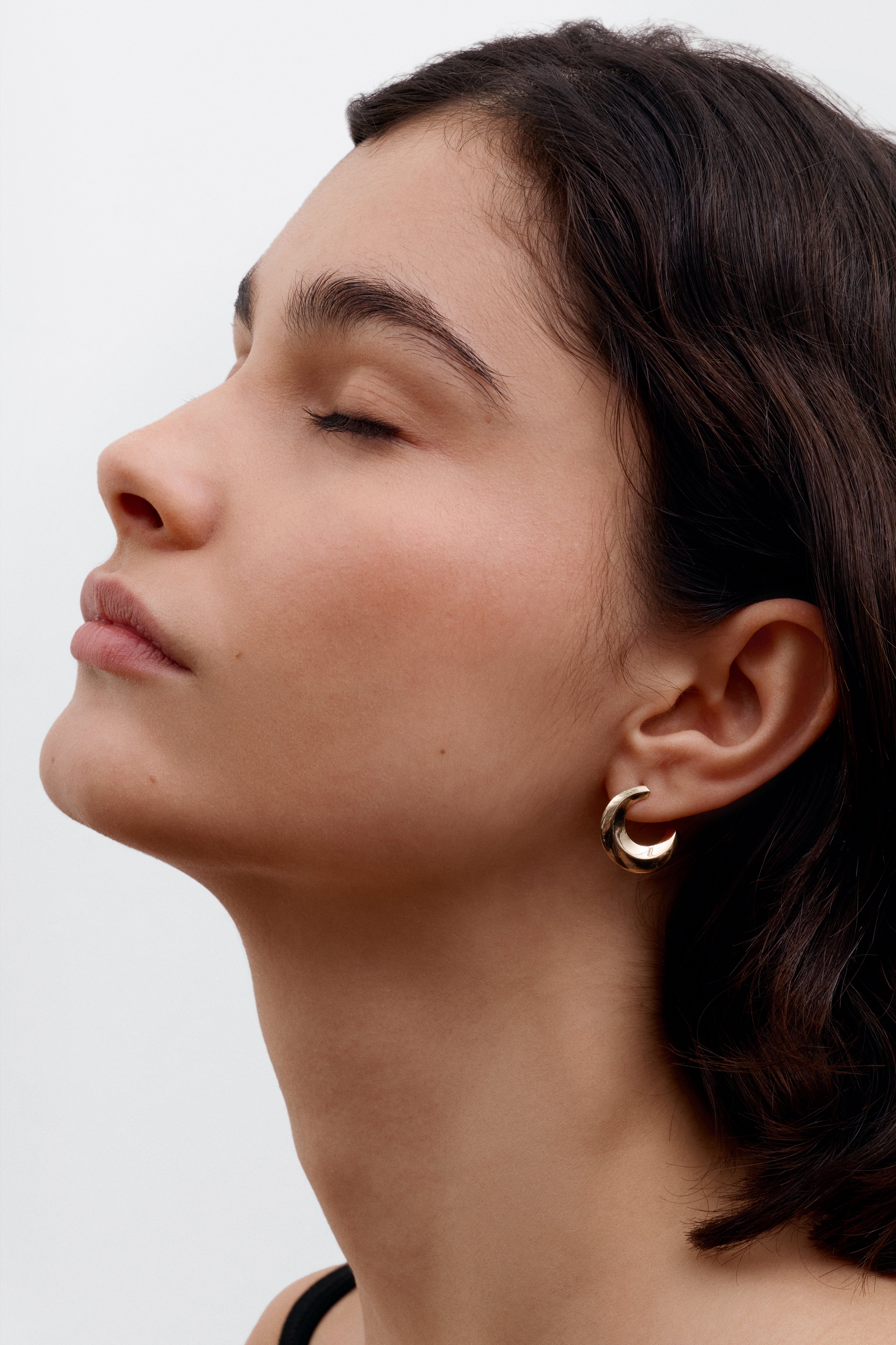 The Contour Earrings by East London jeweller Rachel Boston | Discover our collections of unique and timeless engagement rings, wedding rings, and modern fine jewellery.