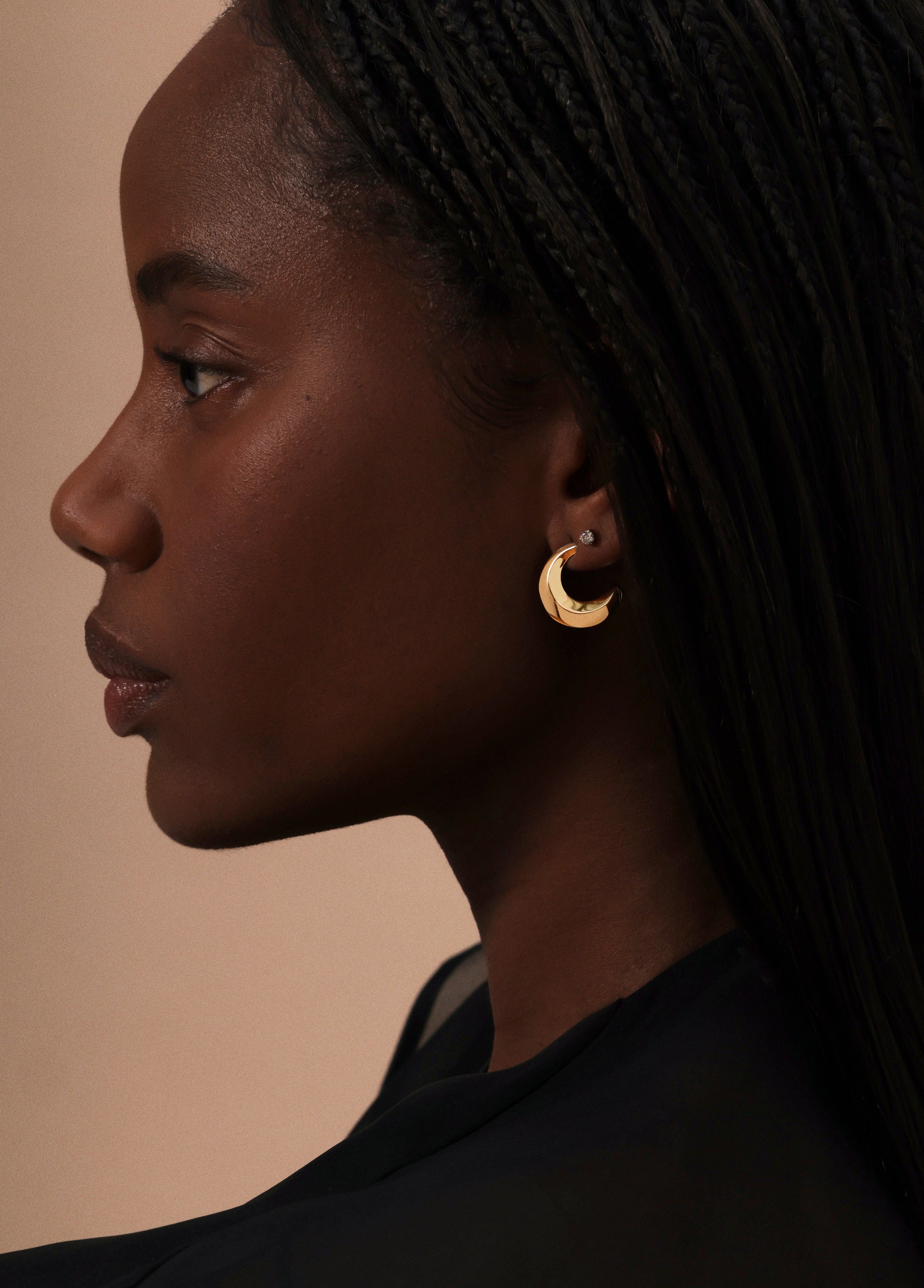 The Contour Earrings by East London jeweller Rachel Boston | Discover our collections of unique and timeless engagement rings, wedding rings, and modern fine jewellery.
