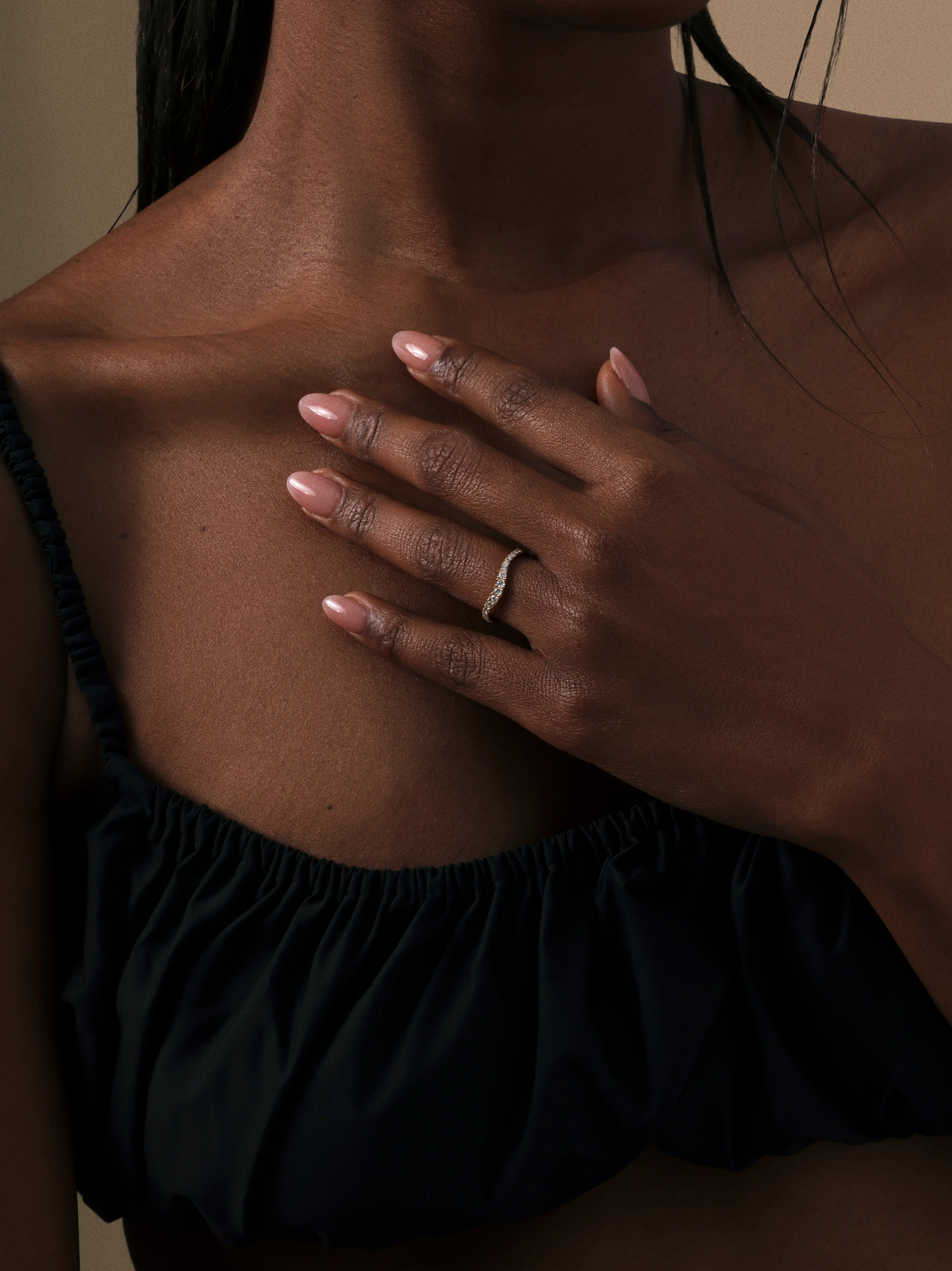 The Tapered Diamond Curve Band by East London jeweller Rachel Boston | Discover our collections of unique and timeless engagement rings, wedding rings, and modern fine jewellery.