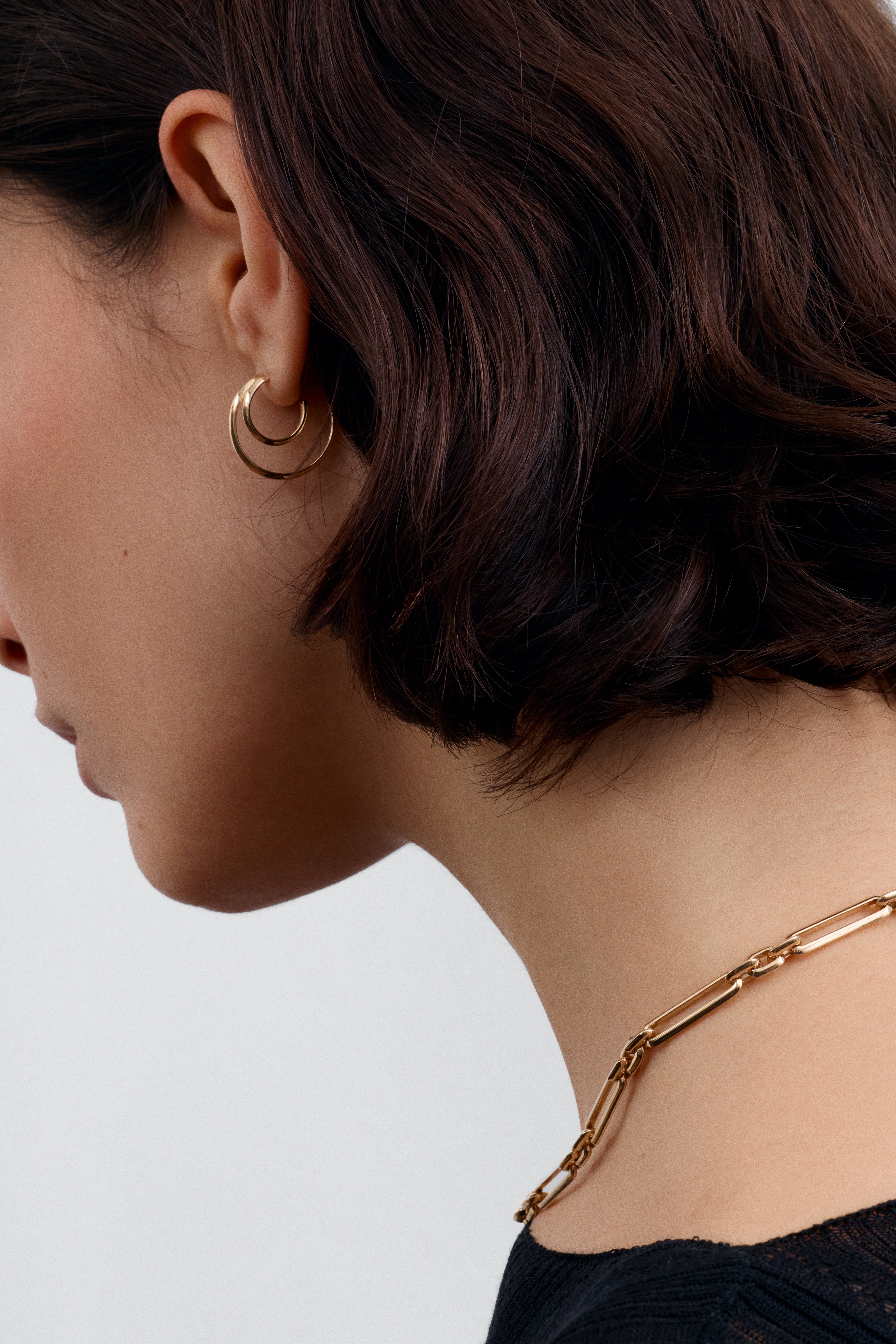 The Double Hoop Earrings by East London jeweller Rachel Boston | Discover our collections of unique and timeless engagement rings, wedding rings, and modern fine jewellery.