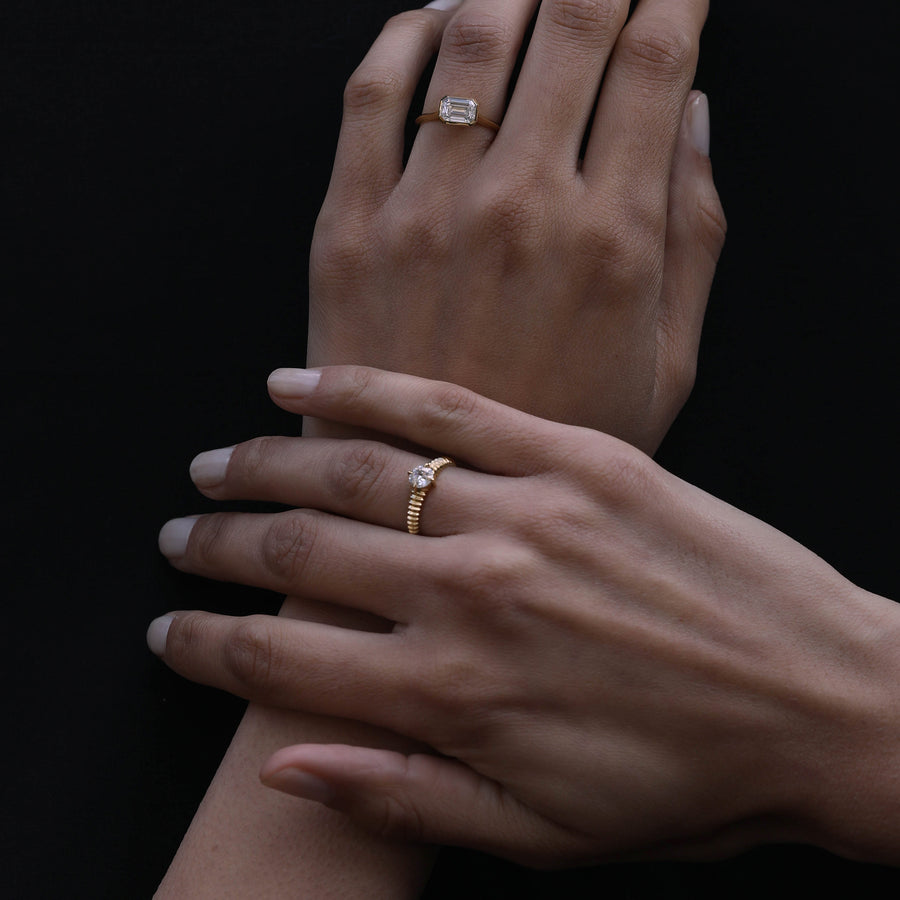 The Ines Ring - Emerald Cut by East London jeweller Rachel Boston | Discover our collections of unique and timeless engagement rings, wedding rings, and modern fine jewellery. - Rachel Boston Jewellery