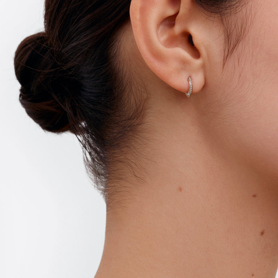 The 10mm Knife Edge Diamond Huggie Hoop Earrings by East London jeweller Rachel Boston | Discover our collections of unique and timeless engagement rings, wedding rings, and modern fine jewellery. - Rachel Boston Jewellery