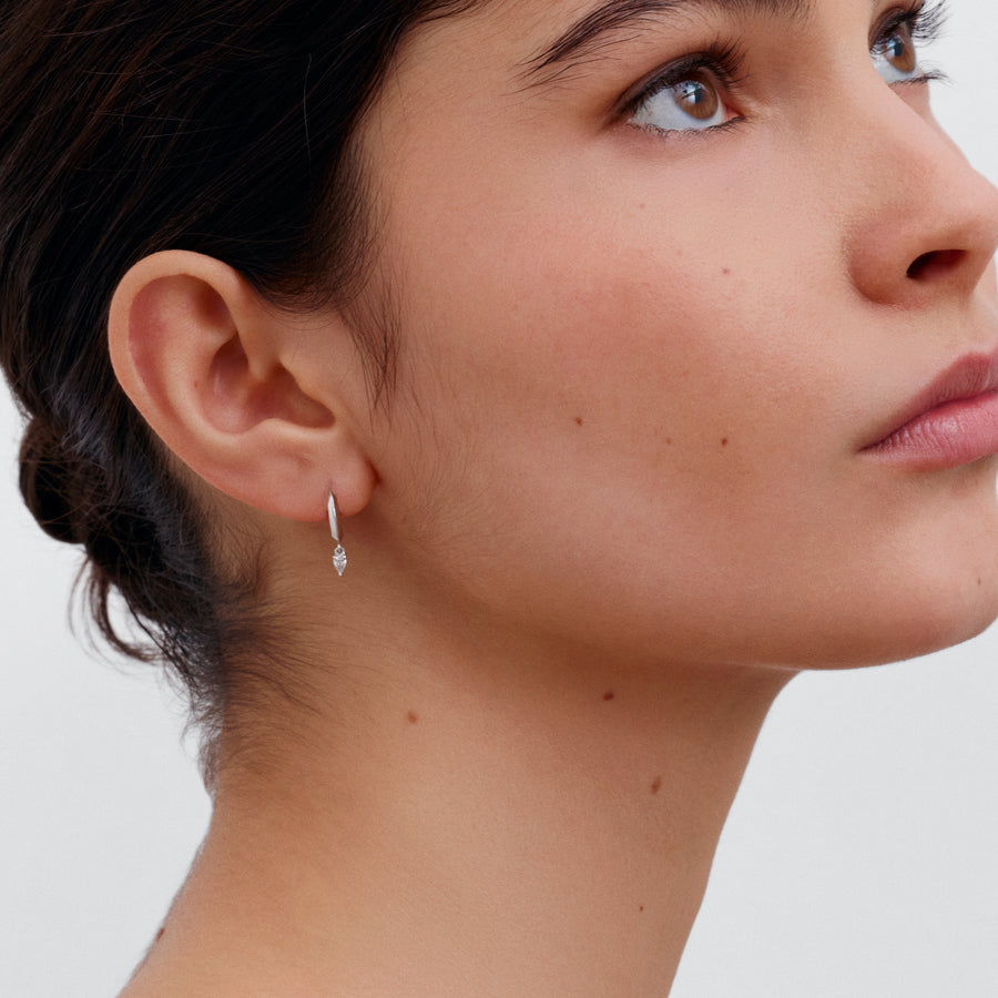 The Knife Edge Hoop Earrings with Pear Diamonds by East London jeweller Rachel Boston | Discover our collections of unique and timeless engagement rings, wedding rings, and modern fine jewellery. - Rachel Boston Jewellery