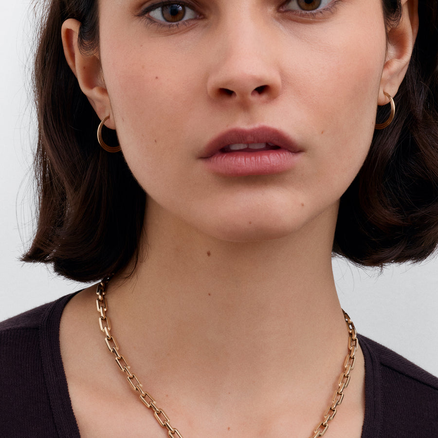 The Adversus Hoop Earrings by East London jeweller Rachel Boston | Discover our collections of unique and timeless engagement rings, wedding rings, and modern fine jewellery. - Rachel Boston Jewellery