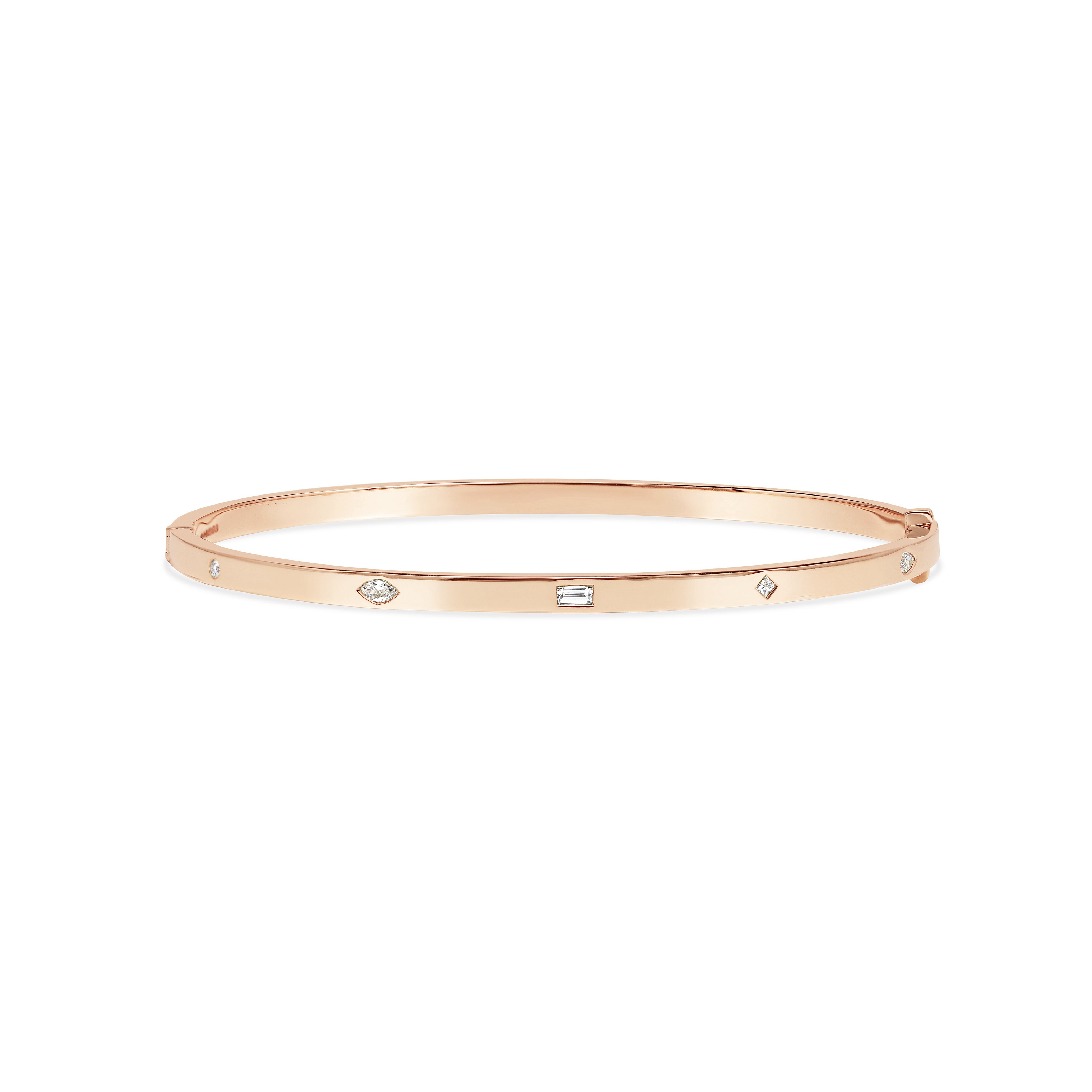The Mixed Diamond Bangle by East London jeweller Rachel Boston | Discover our collections of unique and timeless engagement rings, wedding rings, and modern fine jewellery.