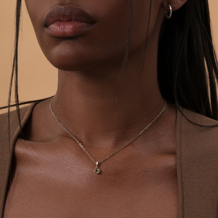 The LARGE DROPLET PERIDOT NECKLACE by East London jeweller Rachel Boston | Discover our collections of unique and timeless engagement rings, wedding rings, and modern fine jewellery. - Rachel Boston Jewellery