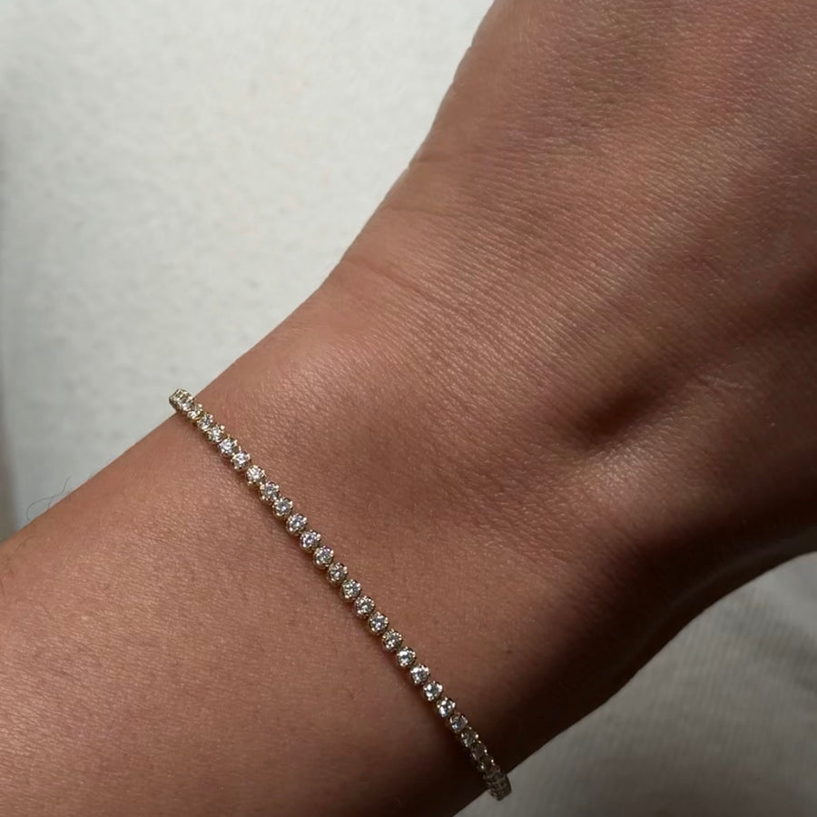 The Round Scallop Diamond Tennis Bracelet by East London jeweller Rachel Boston | Discover our collections of unique and timeless engagement rings, wedding rings, and modern fine jewellery. - Rachel Boston Jewellery