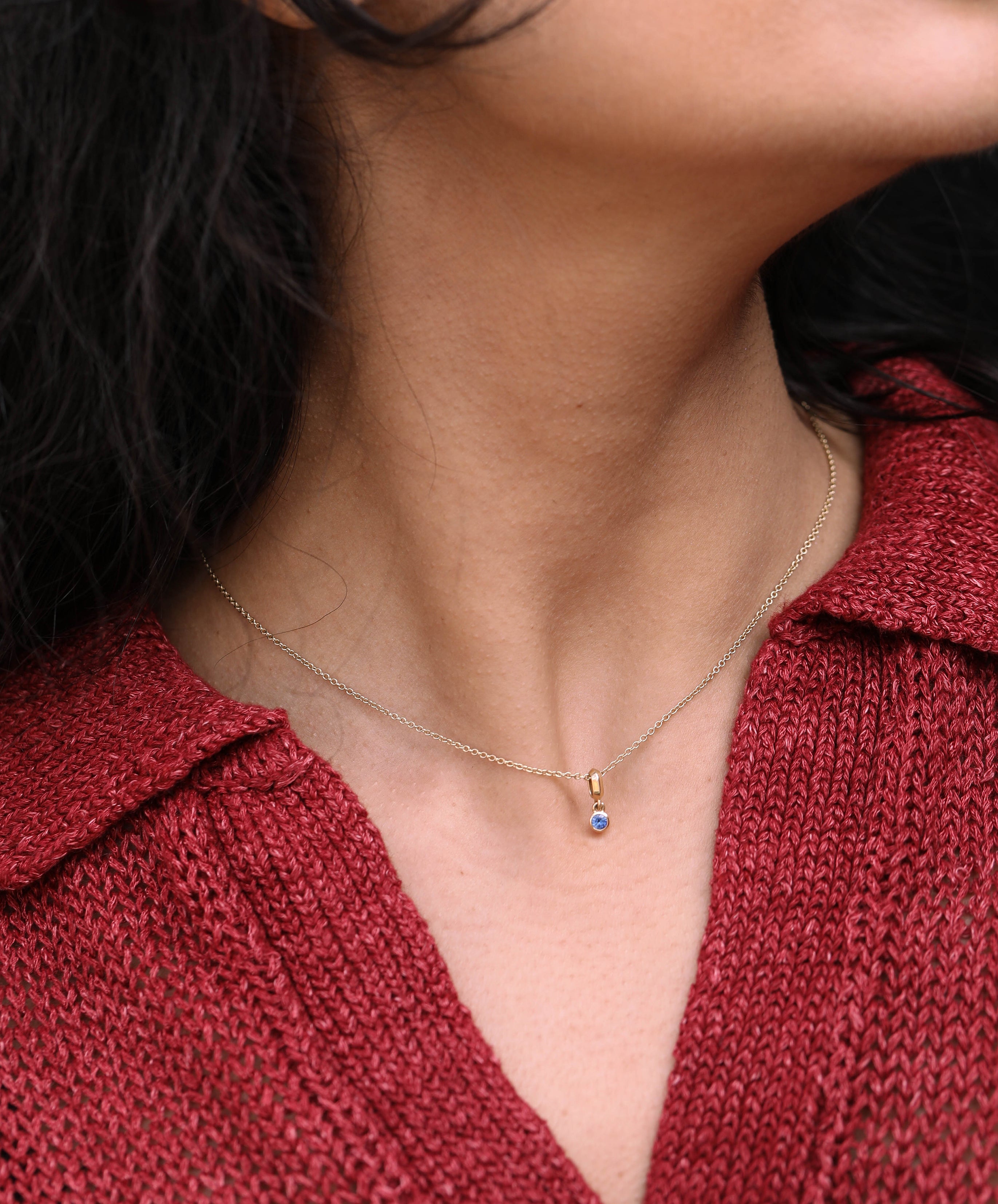 The Small Droplet Sapphire Necklace by East London jeweller Rachel Boston | Discover our collections of unique and timeless engagement rings, wedding rings, and modern fine jewellery.