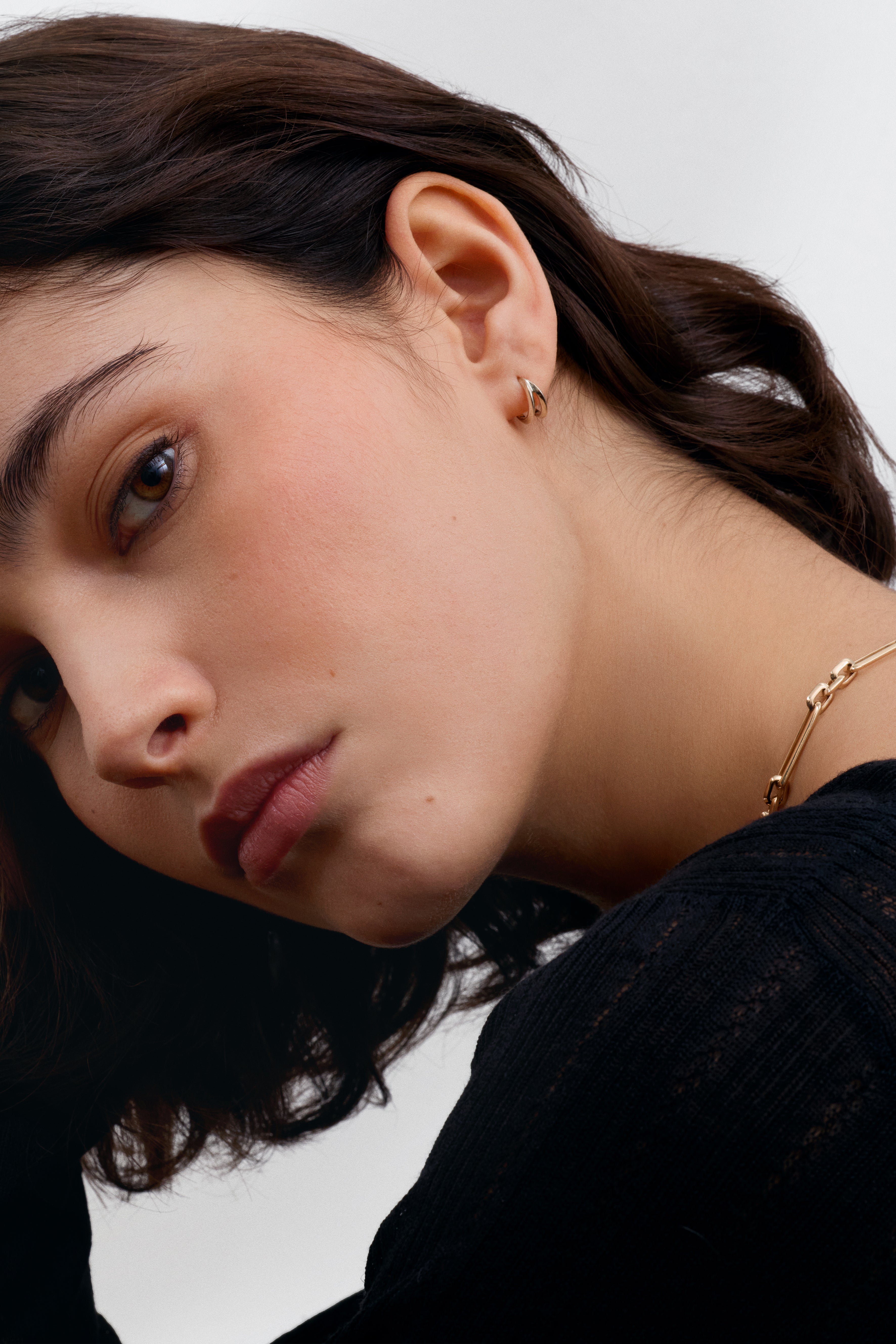 The Split Claw Earrings by East London jeweller Rachel Boston | Discover our collections of unique and timeless engagement rings, wedding rings, and modern fine jewellery.