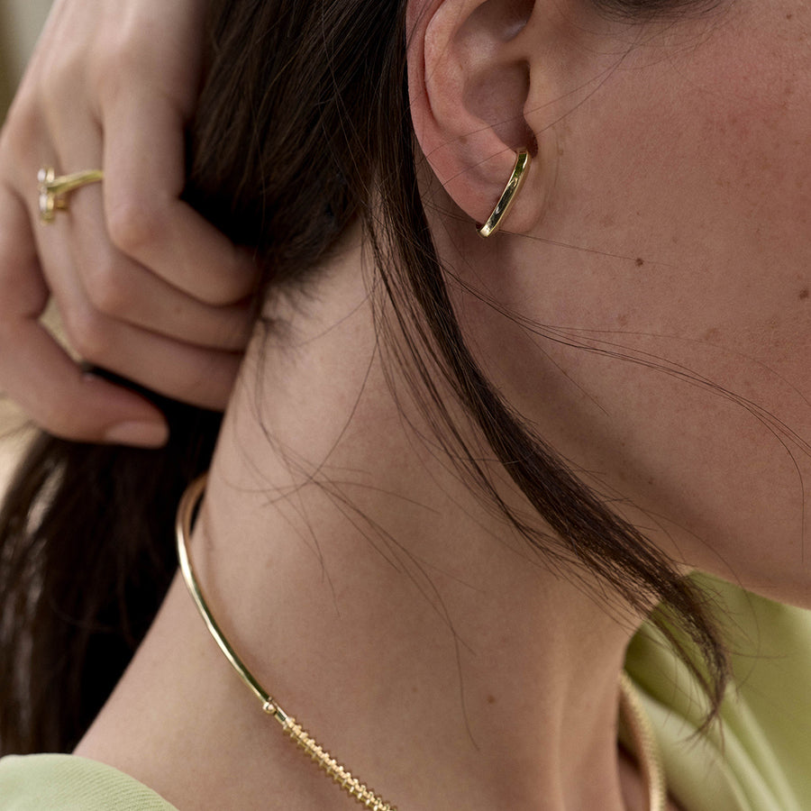 The ARC Torque by East London jeweller Rachel Boston | Discover our collections of unique and timeless engagement rings, wedding rings, and modern fine jewellery. - Rachel Boston Jewellery