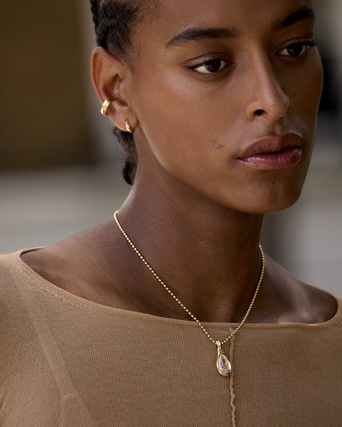 The Thread Ear Cuff by East London jeweller Rachel Boston | Discover our collections of unique and timeless engagement rings, wedding rings, and modern fine jewellery.