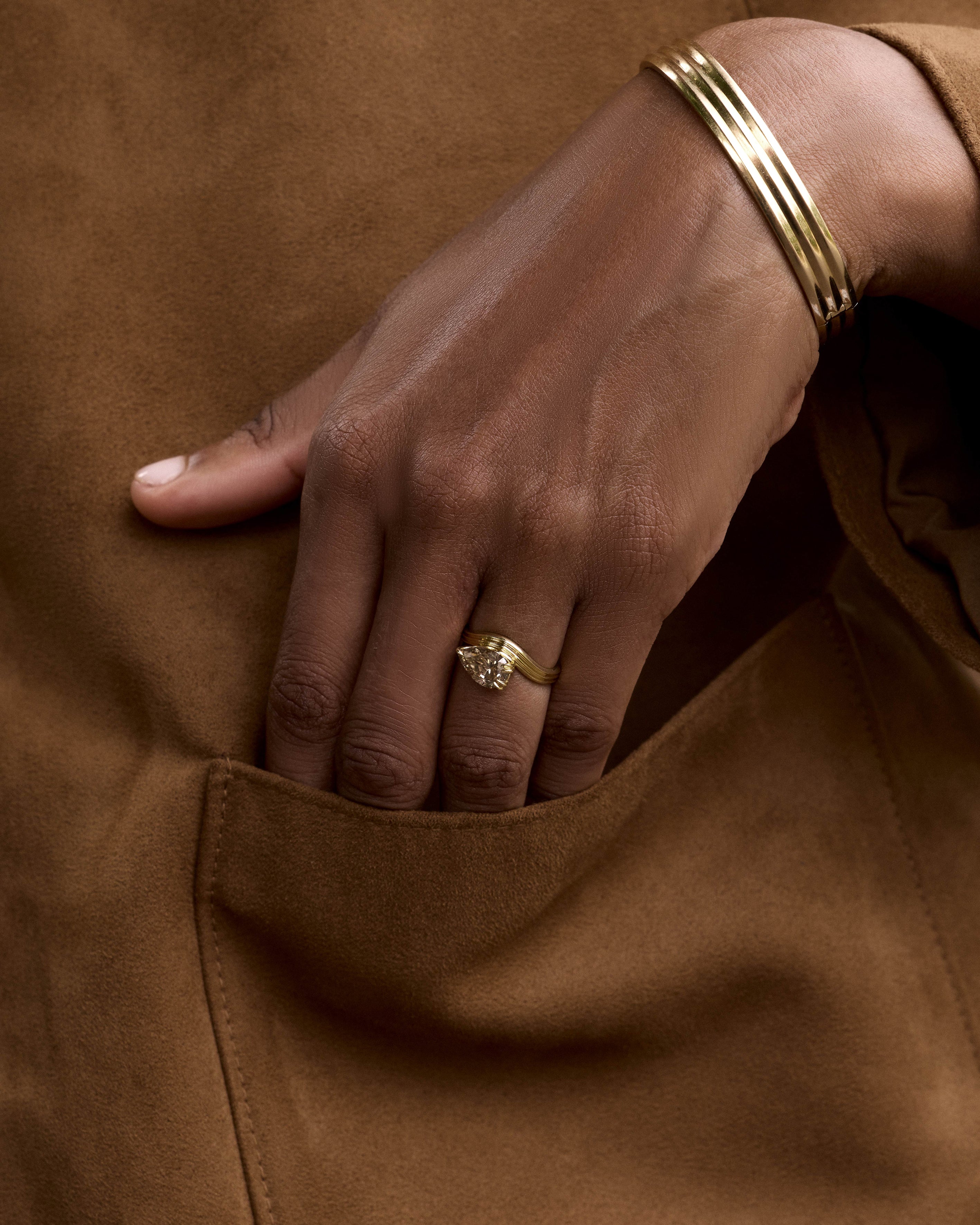 The Origin Ring by East London jeweller Rachel Boston | Discover our collections of unique and timeless engagement rings, wedding rings, and modern fine jewellery.