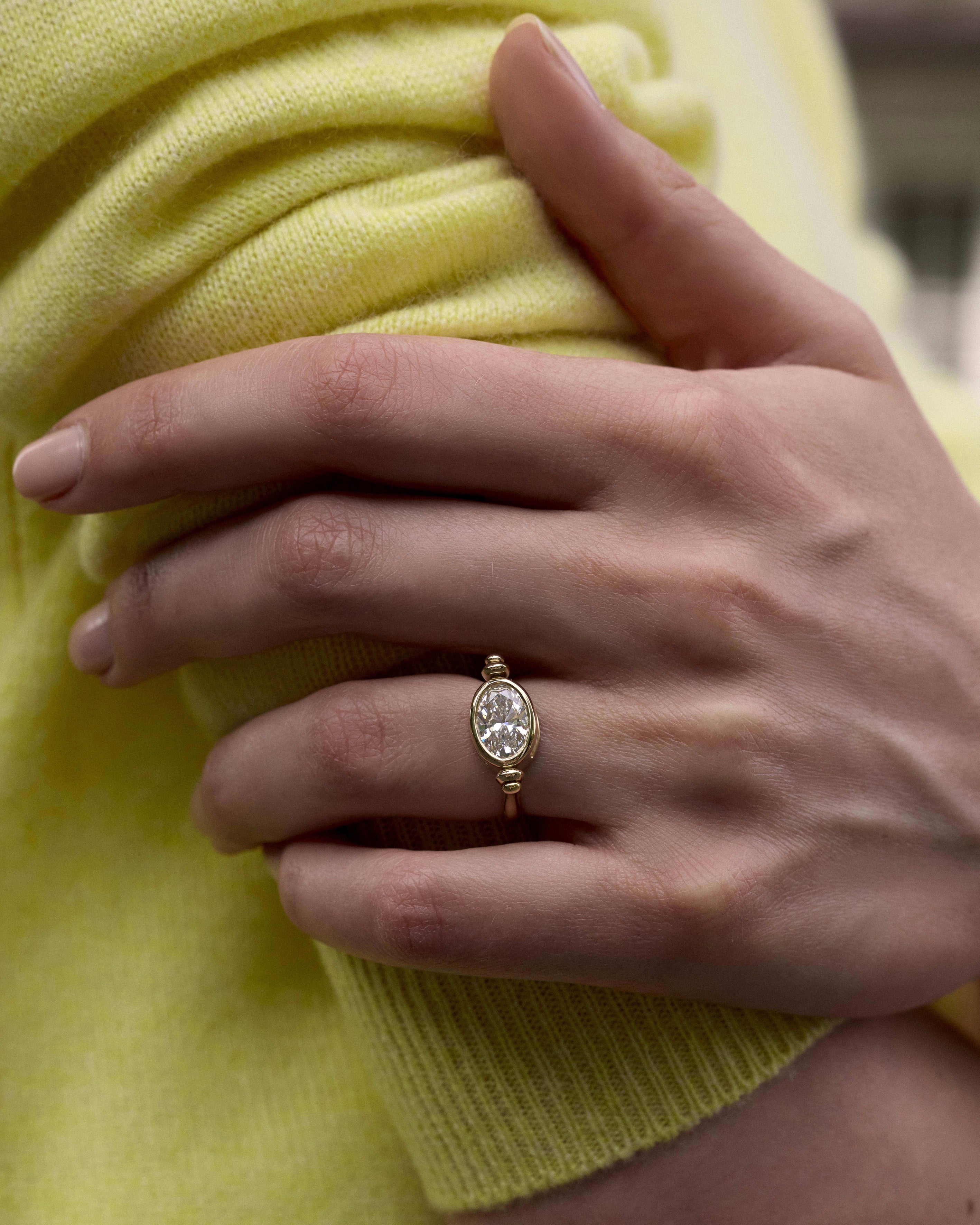 The Pivot Ring by East London jeweller Rachel Boston | Discover our collections of unique and timeless engagement rings, wedding rings, and modern fine jewellery.