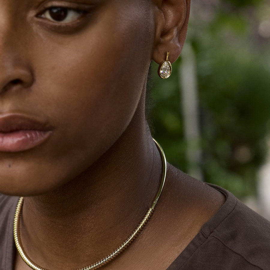 The ARC Torque by East London jeweller Rachel Boston | Discover our collections of unique and timeless engagement rings, wedding rings, and modern fine jewellery. - Rachel Boston Jewellery