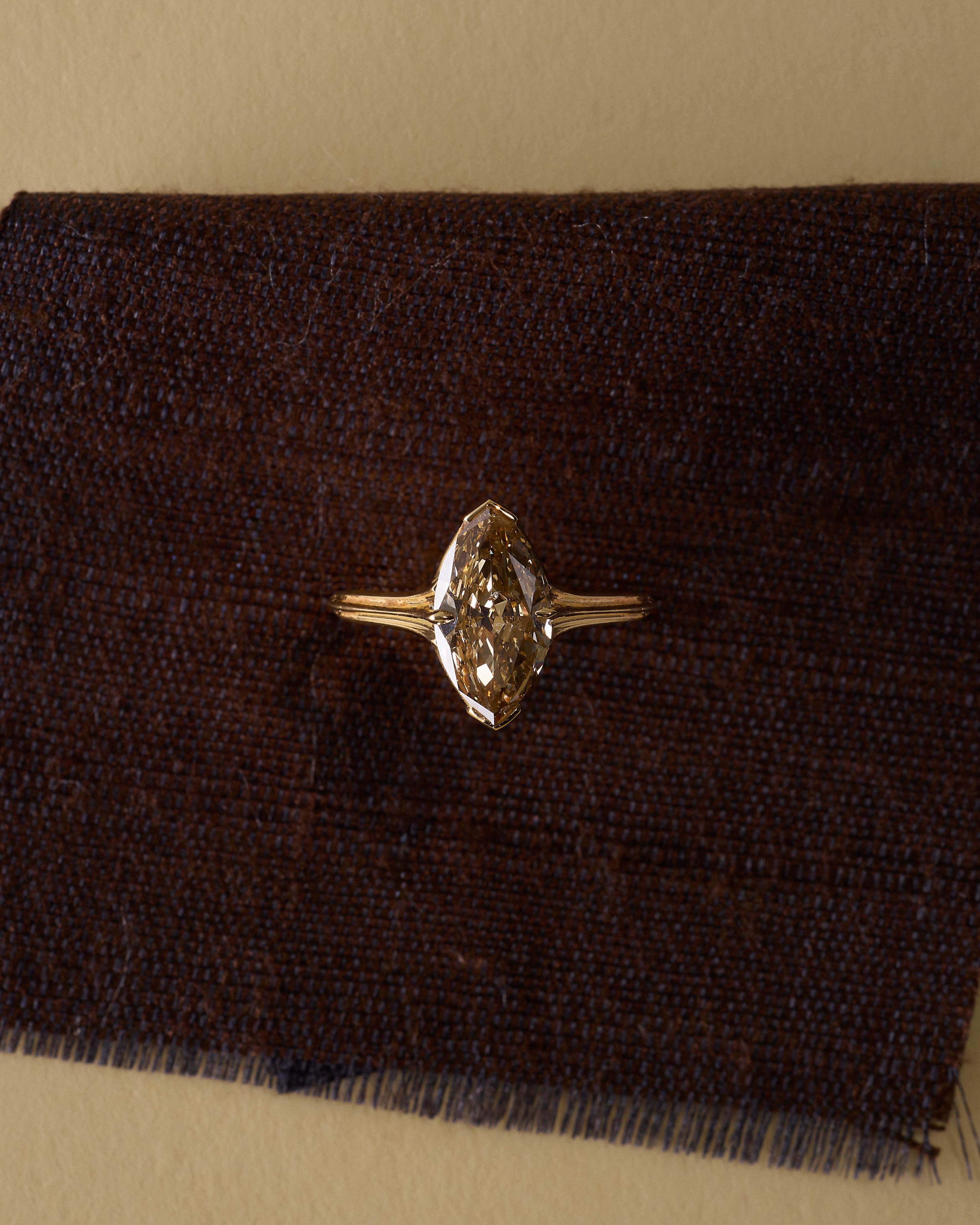 The X - CONTINUUM Ring by East London jeweller Rachel Boston | Discover our collections of unique and timeless engagement rings, wedding rings, and modern fine jewellery.