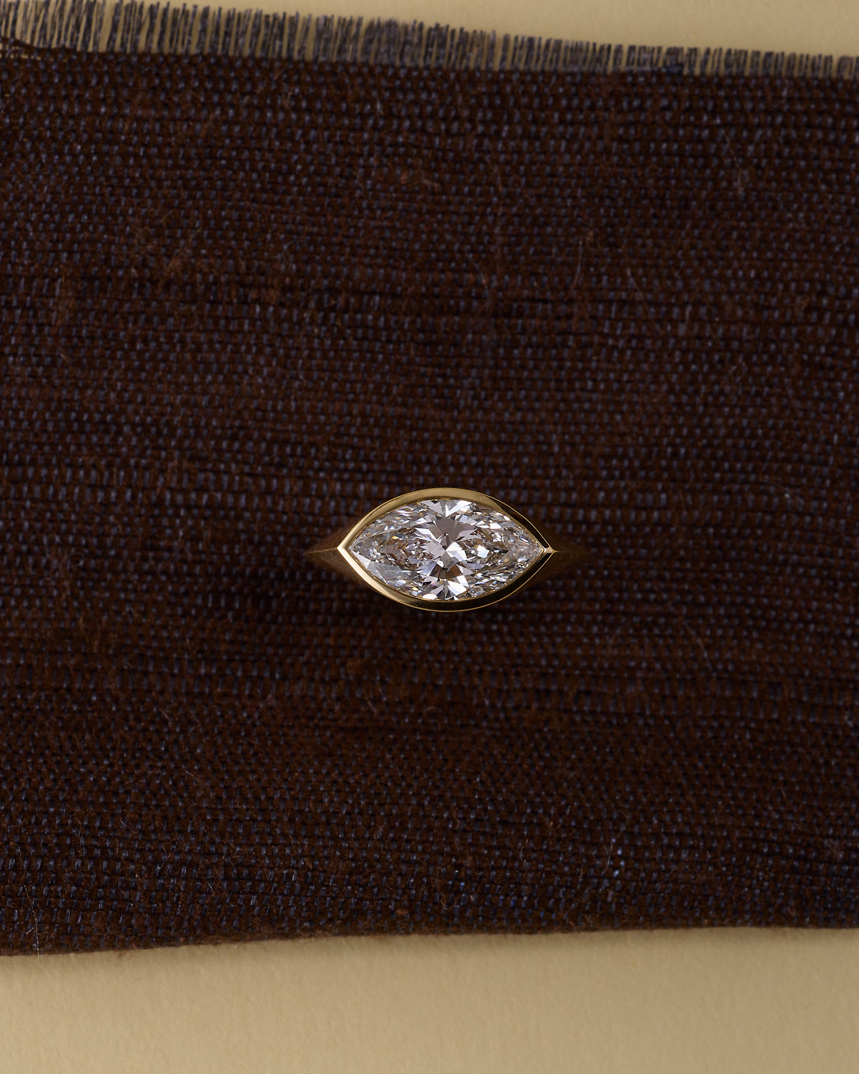 The Axis Ring by East London jeweller Rachel Boston | Discover our collections of unique and timeless engagement rings, wedding rings, and modern fine jewellery.