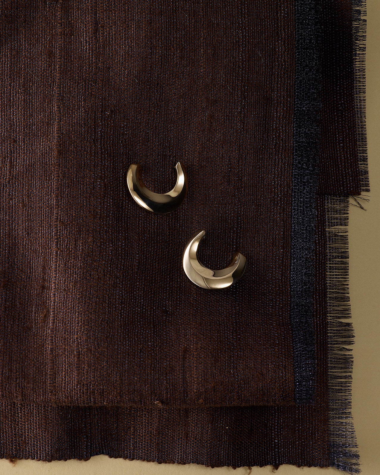 The Contour Earrings by East London jeweller Rachel Boston | Discover our collections of unique and timeless engagement rings, wedding rings, and modern fine jewellery.