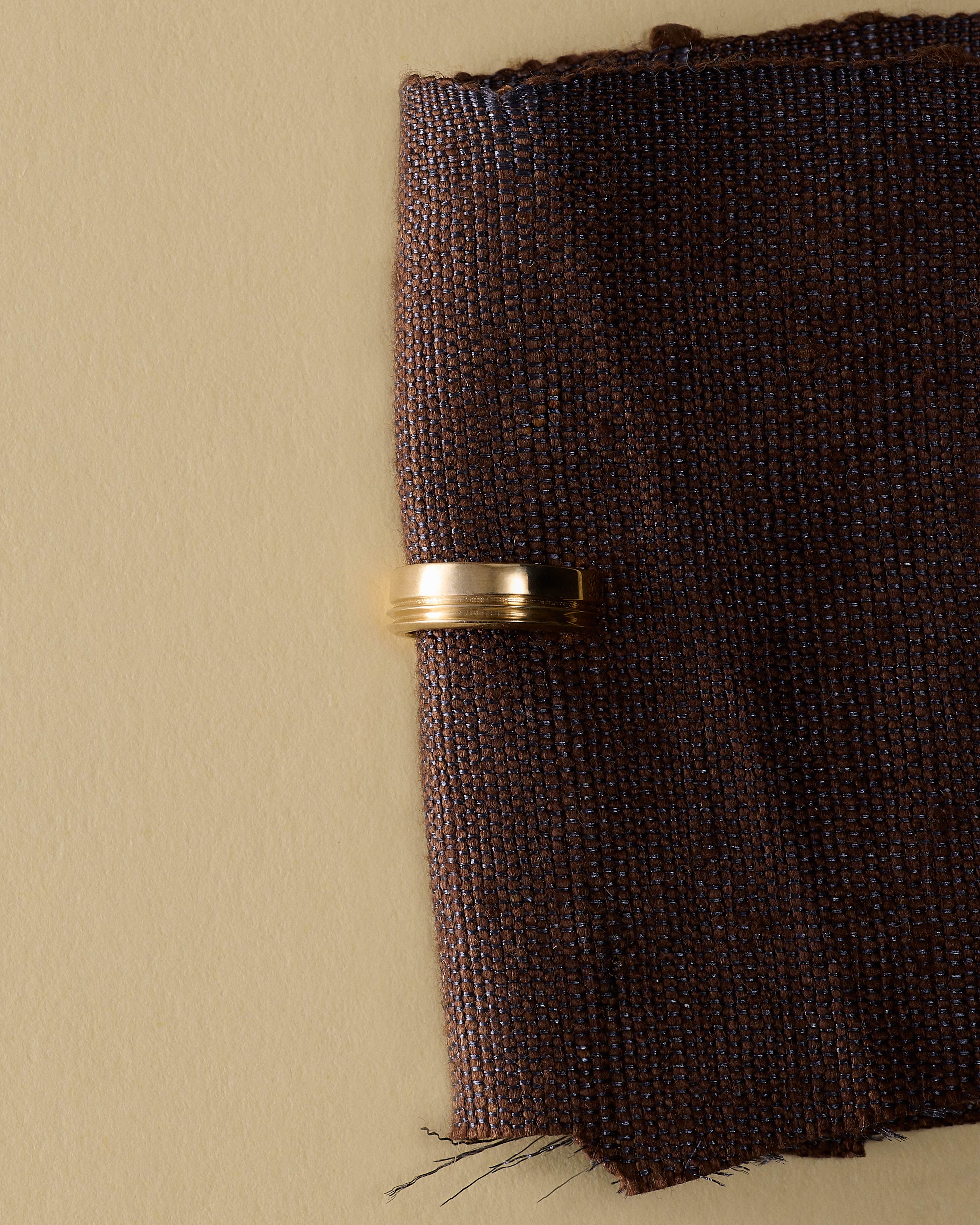 The Thread Ear Cuff by East London jeweller Rachel Boston | Discover our collections of unique and timeless engagement rings, wedding rings, and modern fine jewellery.