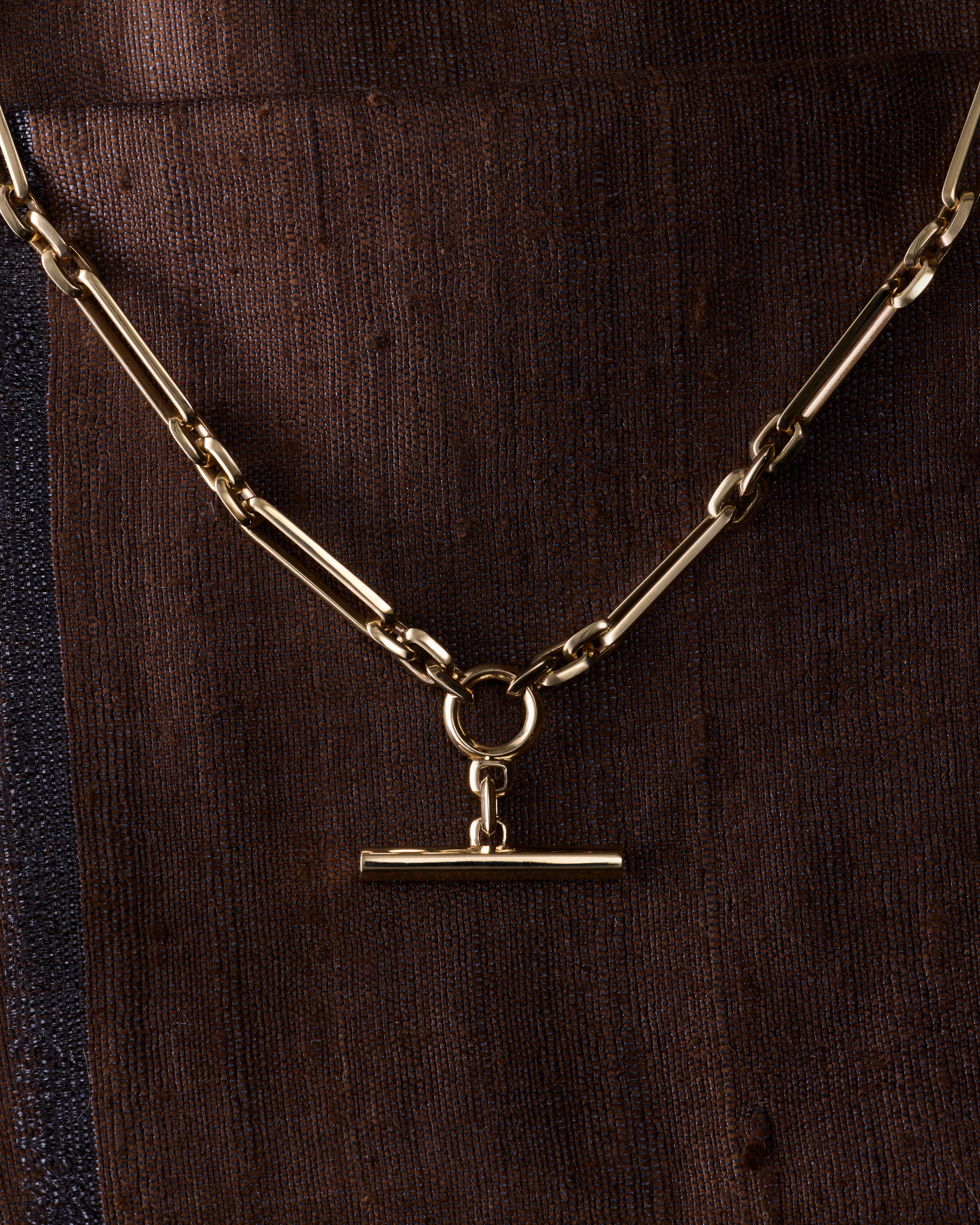 The Loop Necklace by East London jeweller Rachel Boston | Discover our collections of unique and timeless engagement rings, wedding rings, and modern fine jewellery.