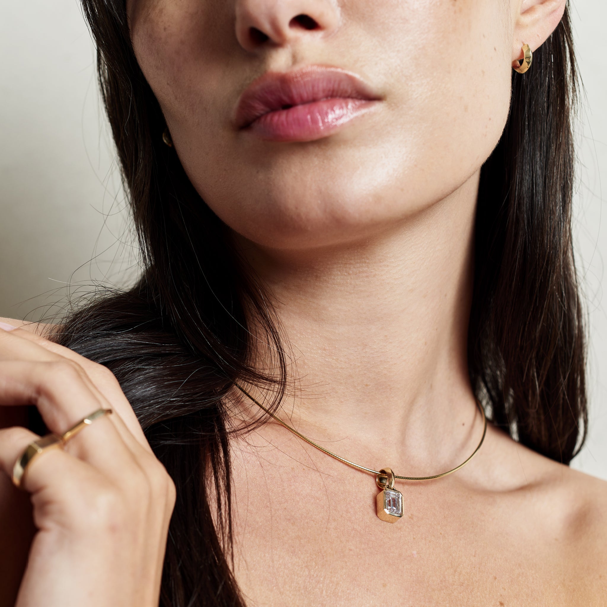 The Chunky Charm Pendant - Emerald Cut by East London jeweller Rachel Boston | Discover our collections of unique and timeless engagement rings, wedding rings, and modern fine jewellery.