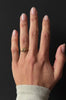 The Current Ring by East London jeweller Rachel Boston | Discover our collections of unique and timeless engagement rings, wedding rings, and modern fine jewellery.