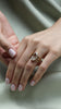 The X - Cupid Ring by East London jeweller Rachel Boston | Discover our collections of unique and timeless engagement rings, wedding rings, and modern fine jewellery.