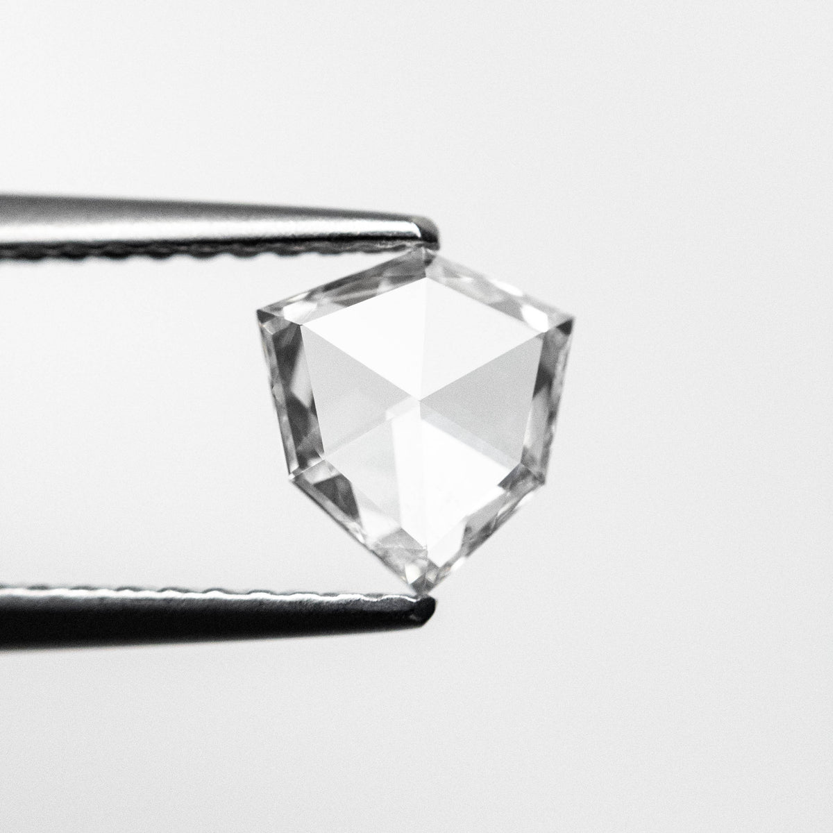 The 0.57ct 6.71x6.36x1.73mm Shield Rosecut 18496-04 by East London jeweller Rachel Boston | Discover our collections of unique and timeless engagement rings, wedding rings, and modern fine jewellery.