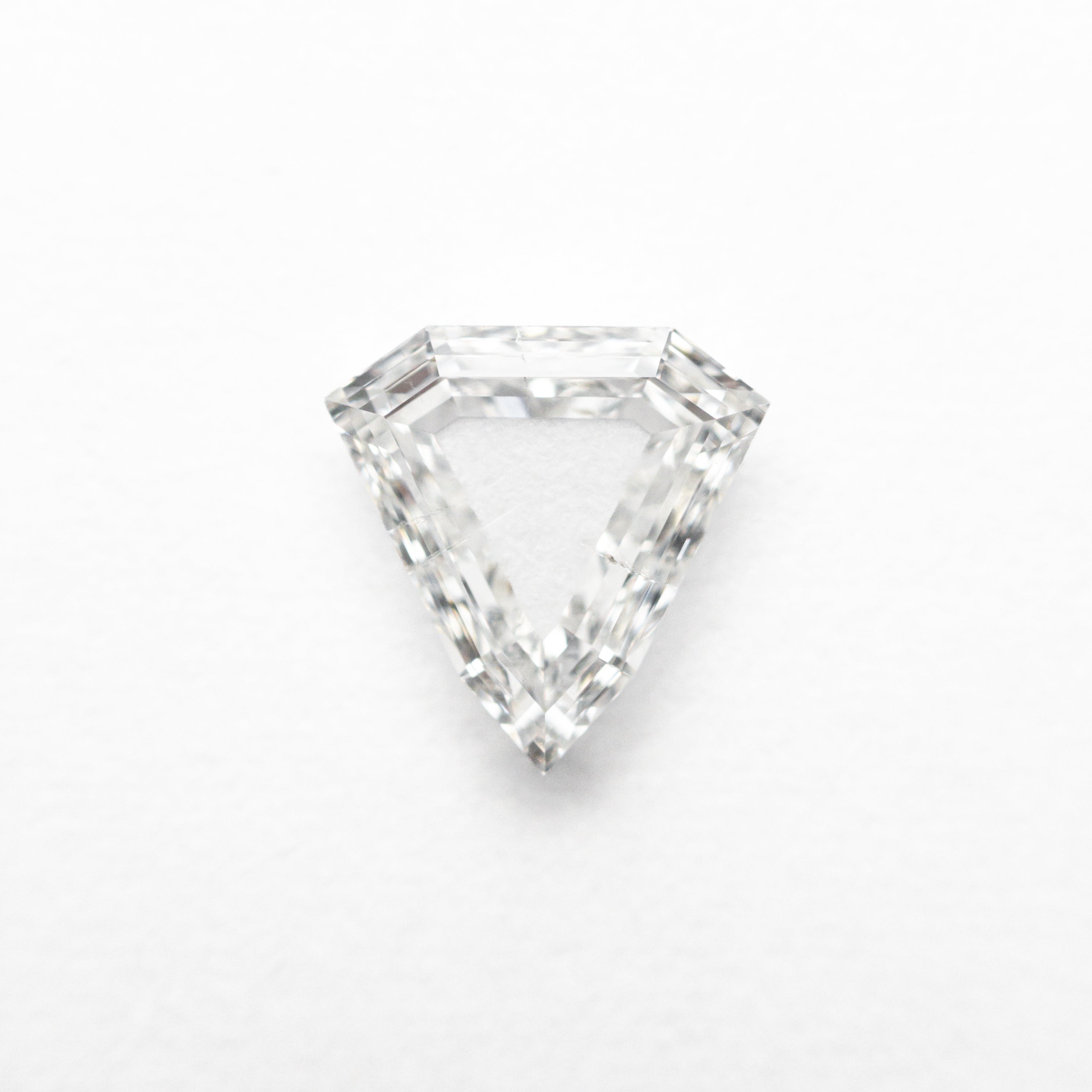 The 0.70ct 6.63x6.61x2.06mm SI2 F Shield Portrait Cut 19438-29 by East London jeweller Rachel Boston | Discover our collections of unique and timeless engagement rings, wedding rings, and modern fine jewellery.