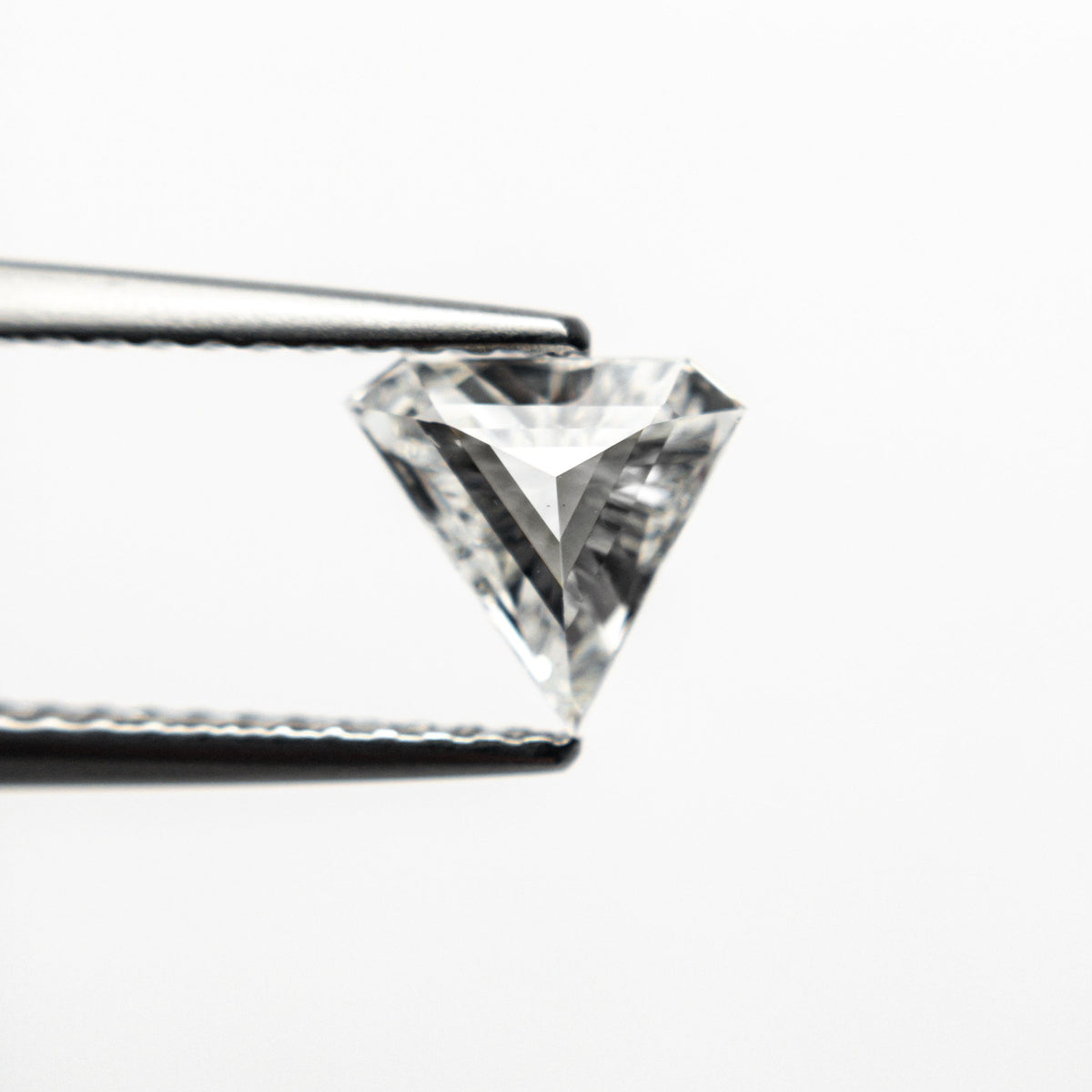The 0.42ct 6.40x6.80x2.14mm SI2 F Shield Step Cut 19677-01 by East London jeweller Rachel Boston | Discover our collections of unique and timeless engagement rings, wedding rings, and modern fine jewellery.