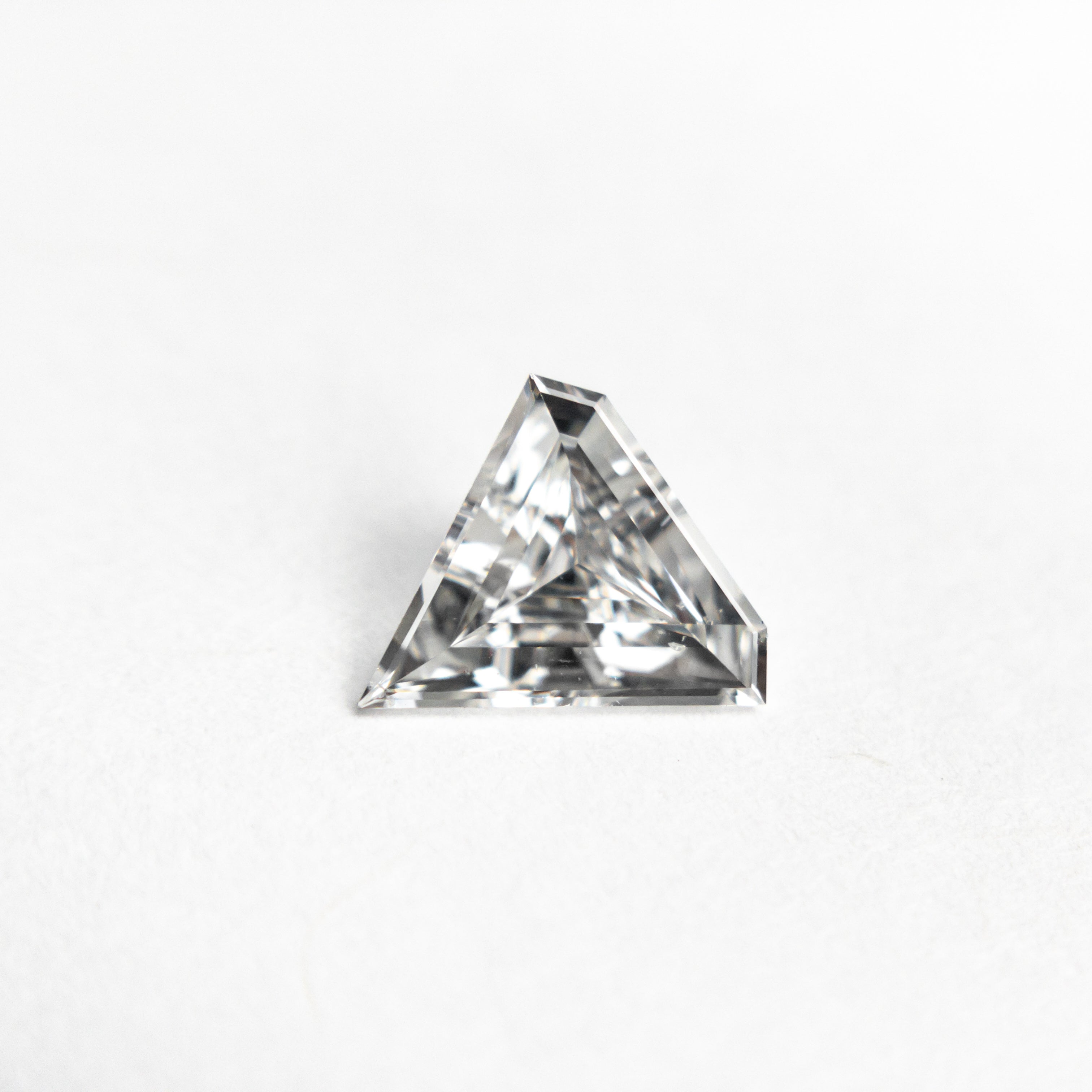 The 0.42ct 6.40x6.80x2.14mm SI2 F Shield Step Cut 19677-01 by East London jeweller Rachel Boston | Discover our collections of unique and timeless engagement rings, wedding rings, and modern fine jewellery.
