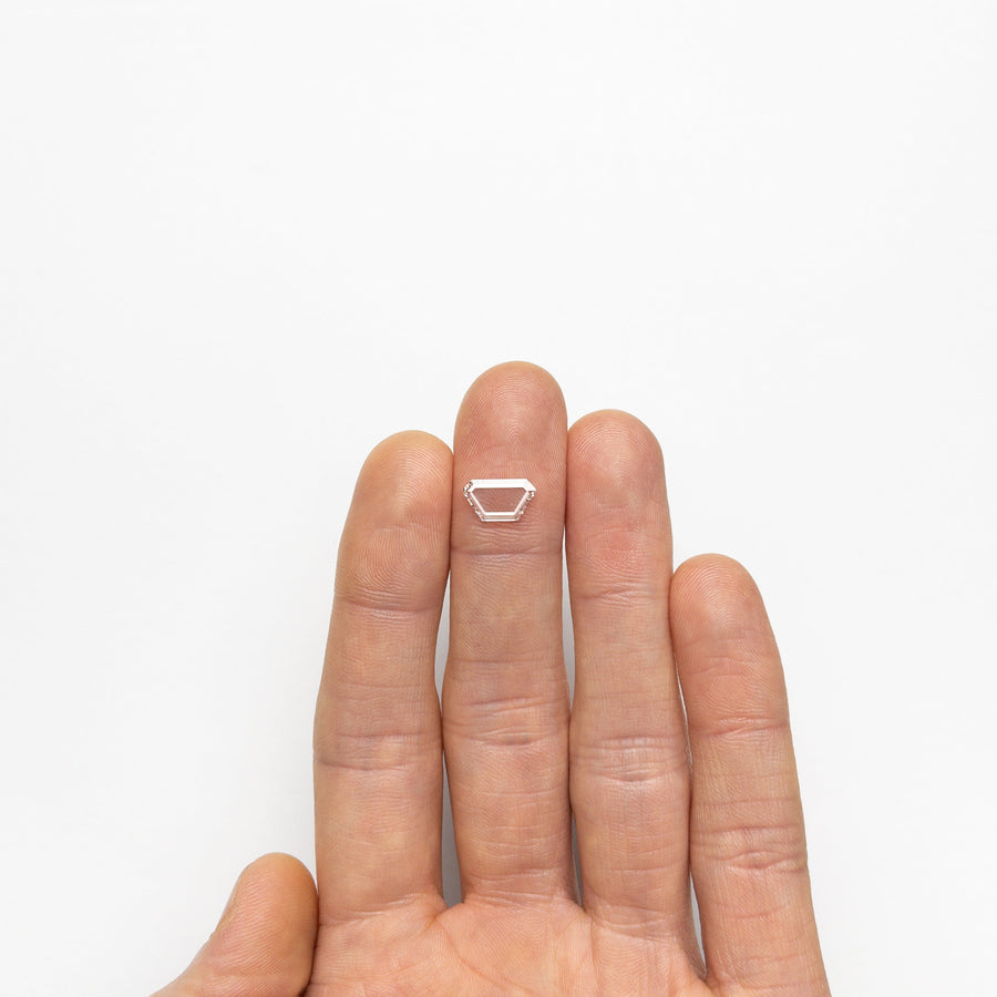 The 0.81ct 10.96x6.05x1.08mm SI1 G Trapezoid Portrait Cut 19854-25 by East London jeweller Rachel Boston | Discover our collections of unique and timeless engagement rings, wedding rings, and modern fine jewellery. - Rachel Boston Jewellery