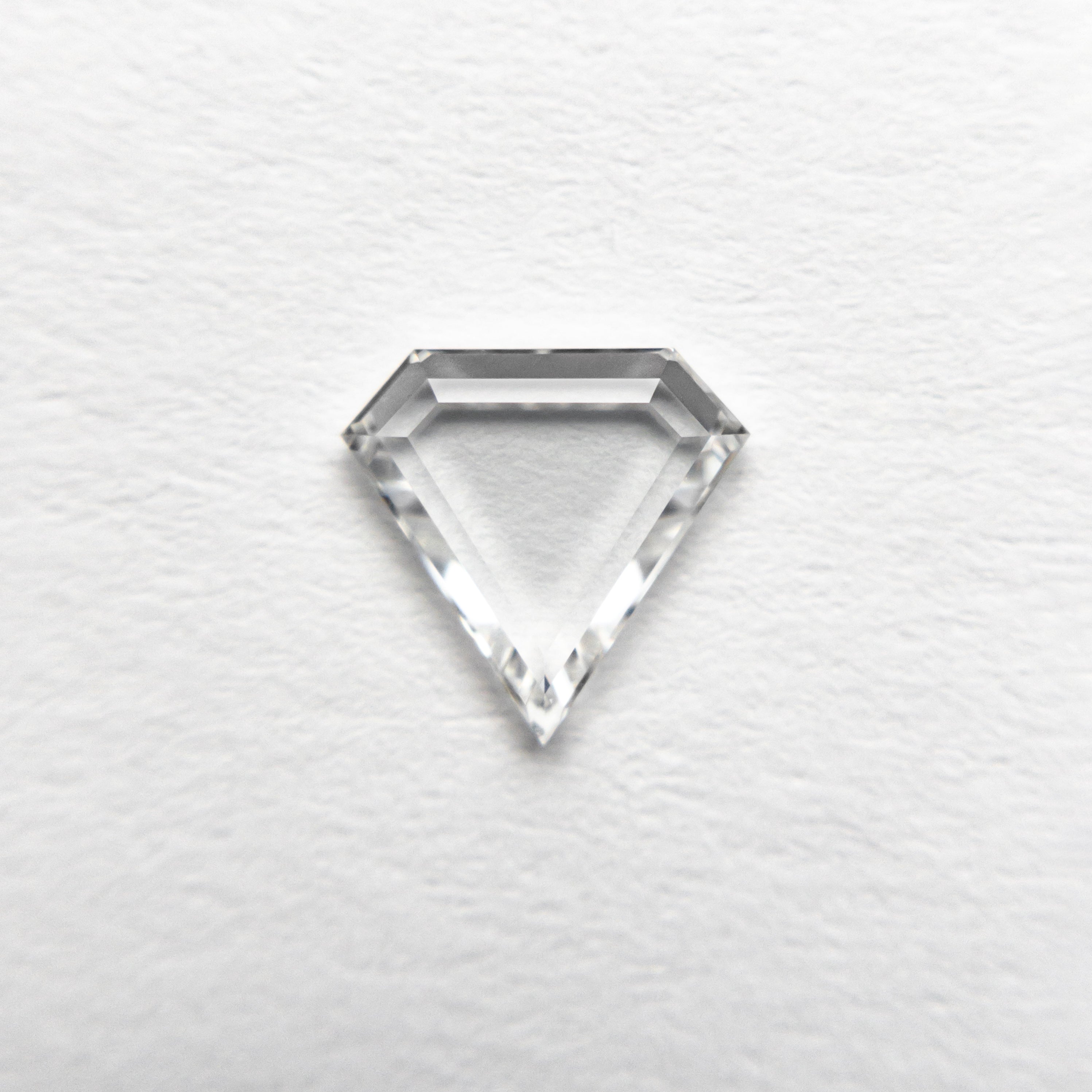 The 0.56ct 6.71x6.91x1.54mm VS1 E Shield Portrait Cut 19854-43 by East London jeweller Rachel Boston | Discover our collections of unique and timeless engagement rings, wedding rings, and modern fine jewellery.