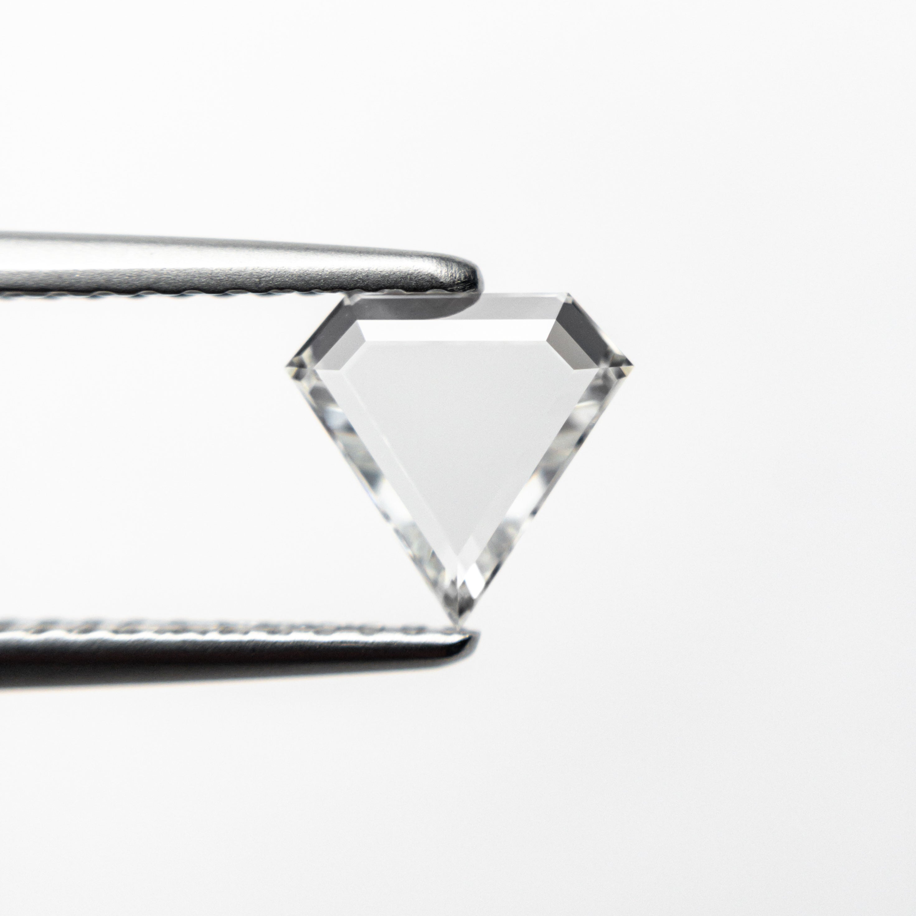 The 0.56ct 6.71x6.91x1.54mm VS1 E Shield Portrait Cut 19854-43 by East London jeweller Rachel Boston | Discover our collections of unique and timeless engagement rings, wedding rings, and modern fine jewellery.