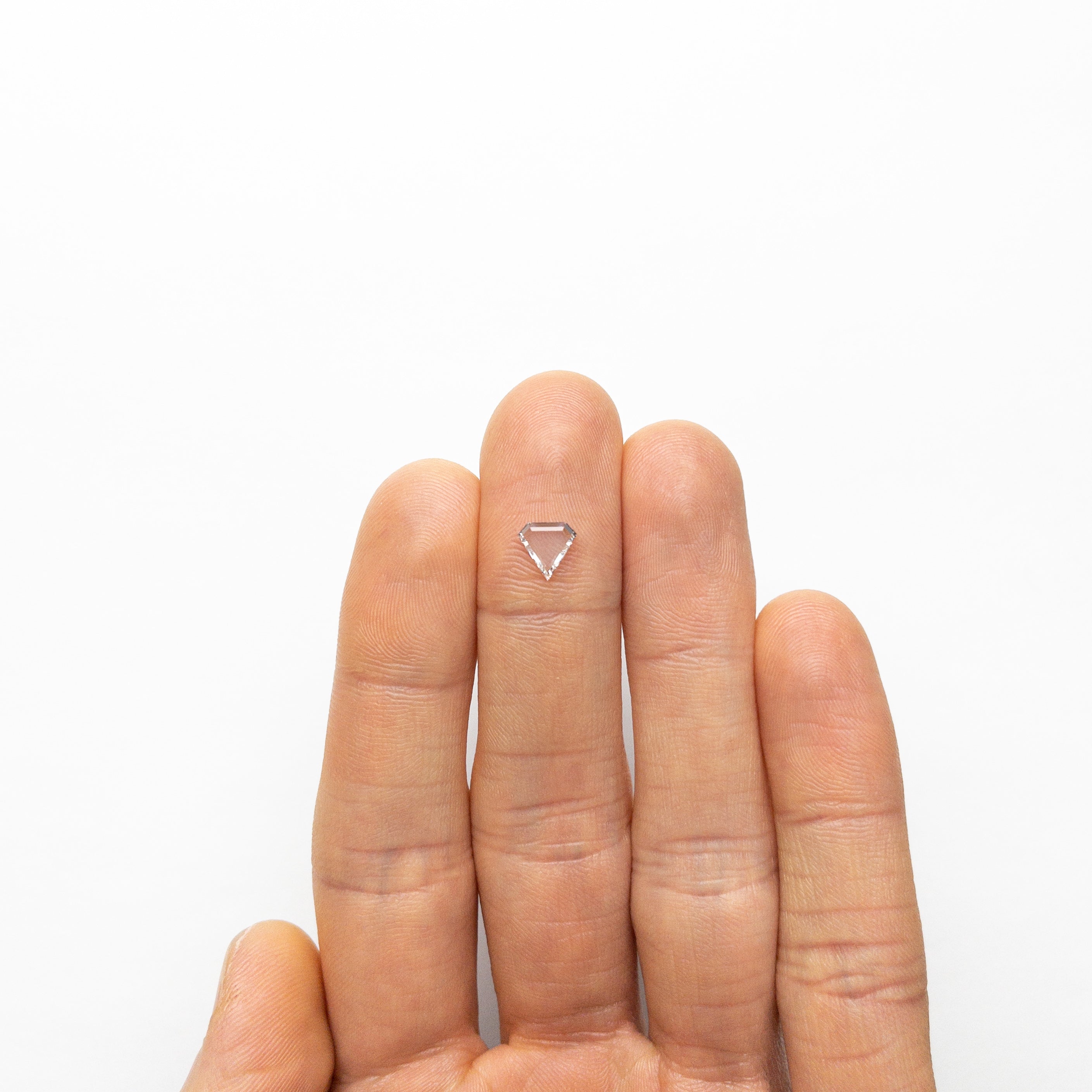 The 0.56ct 6.71x6.91x1.54mm VS1 E Shield Portrait Cut 19854-43 by East London jeweller Rachel Boston | Discover our collections of unique and timeless engagement rings, wedding rings, and modern fine jewellery.