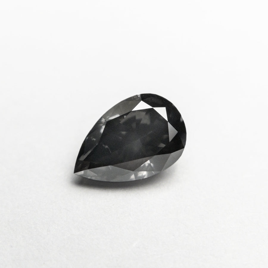 The 0.74ct 6.99x4.67x3.12mm SI2 Fancy Dark Grey Pear Brilliant 19923-11 by East London jeweller Rachel Boston | Discover our collections of unique and timeless engagement rings, wedding rings, and modern fine jewellery. - Rachel Boston Jewellery
