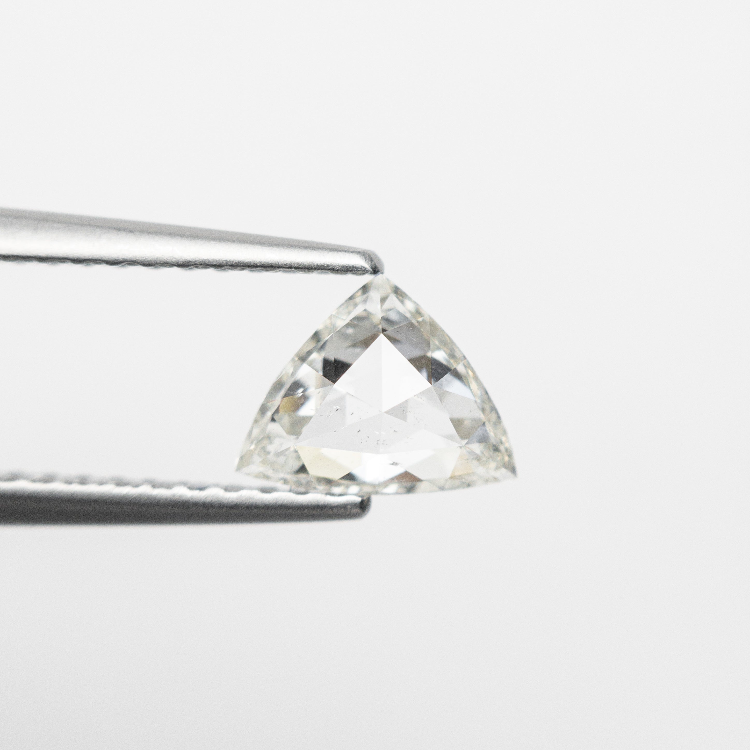 The 0.63ct 5.57x7.15x2.44mm SI2 K Trillion Rosecut 🇨🇦 21247-01 by East London jeweller Rachel Boston | Discover our collections of unique and timeless engagement rings, wedding rings, and modern fine jewellery.