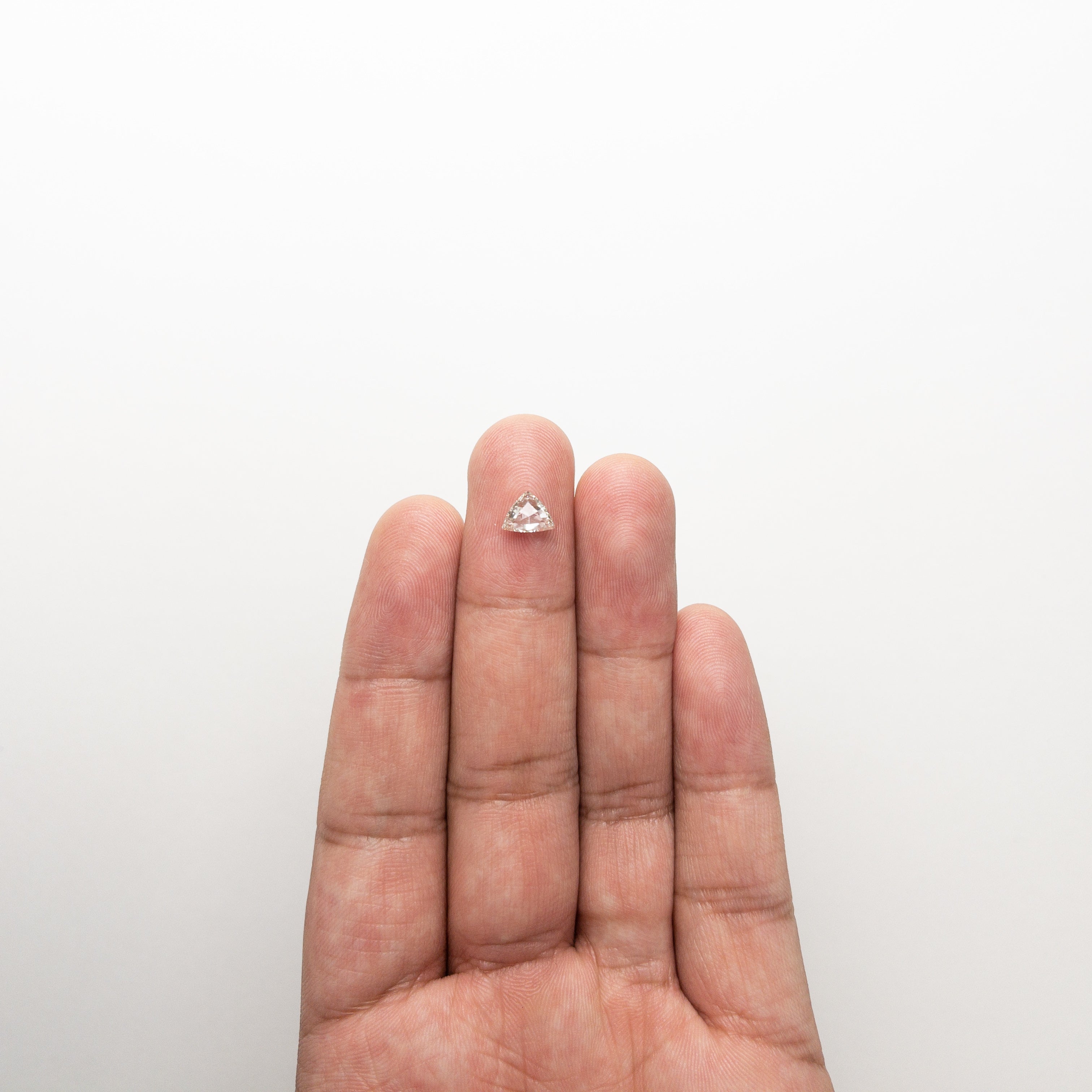 The 0.63ct 5.57x7.15x2.44mm SI2 K Trillion Rosecut 🇨🇦 21247-01 by East London jeweller Rachel Boston | Discover our collections of unique and timeless engagement rings, wedding rings, and modern fine jewellery.