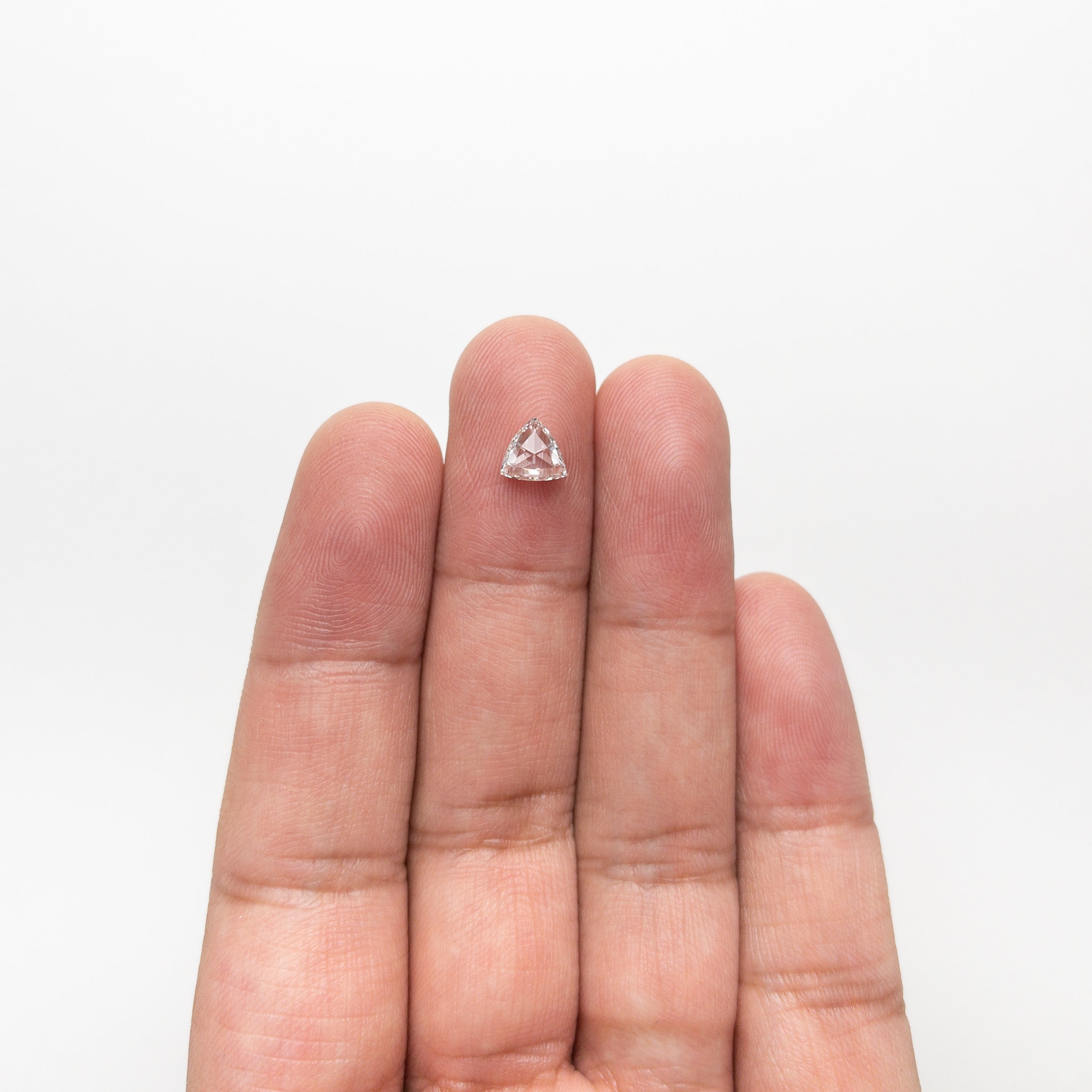 The 0.70ct 6.24x6.24x2.49mm VS1 F Trillion Rosecut 🇨🇦 21301-01 by East London jeweller Rachel Boston | Discover our collections of unique and timeless engagement rings, wedding rings, and modern fine jewellery.