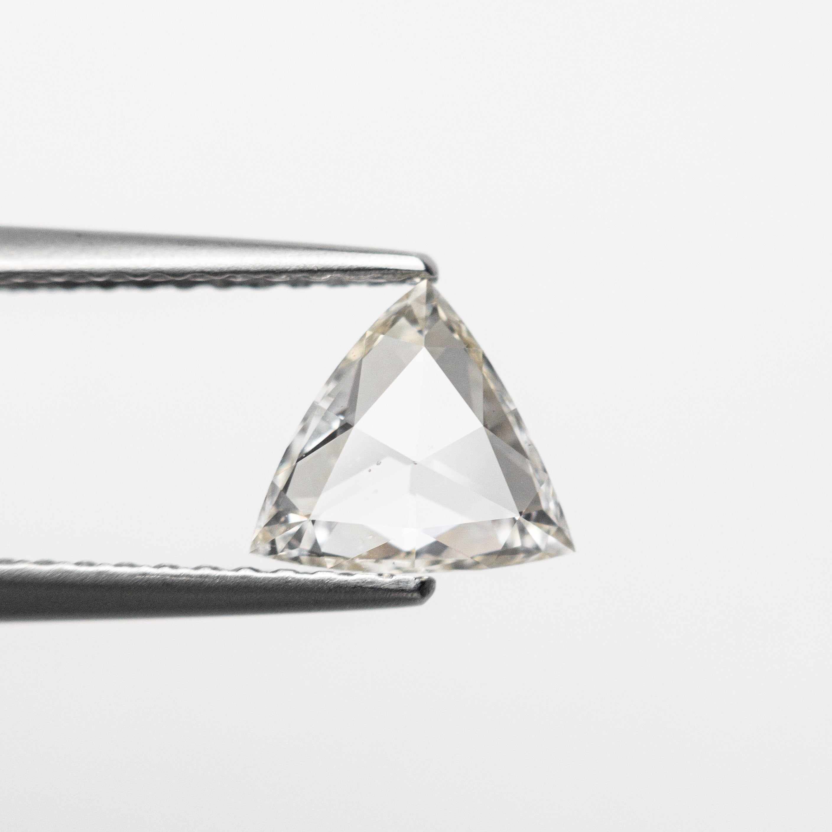 The 0.73ct 6.65x6.84x2.22mm SI1 L Trillion Rosecut 🇨🇦 21370-01 by East London jeweller Rachel Boston | Discover our collections of unique and timeless engagement rings, wedding rings, and modern fine jewellery.