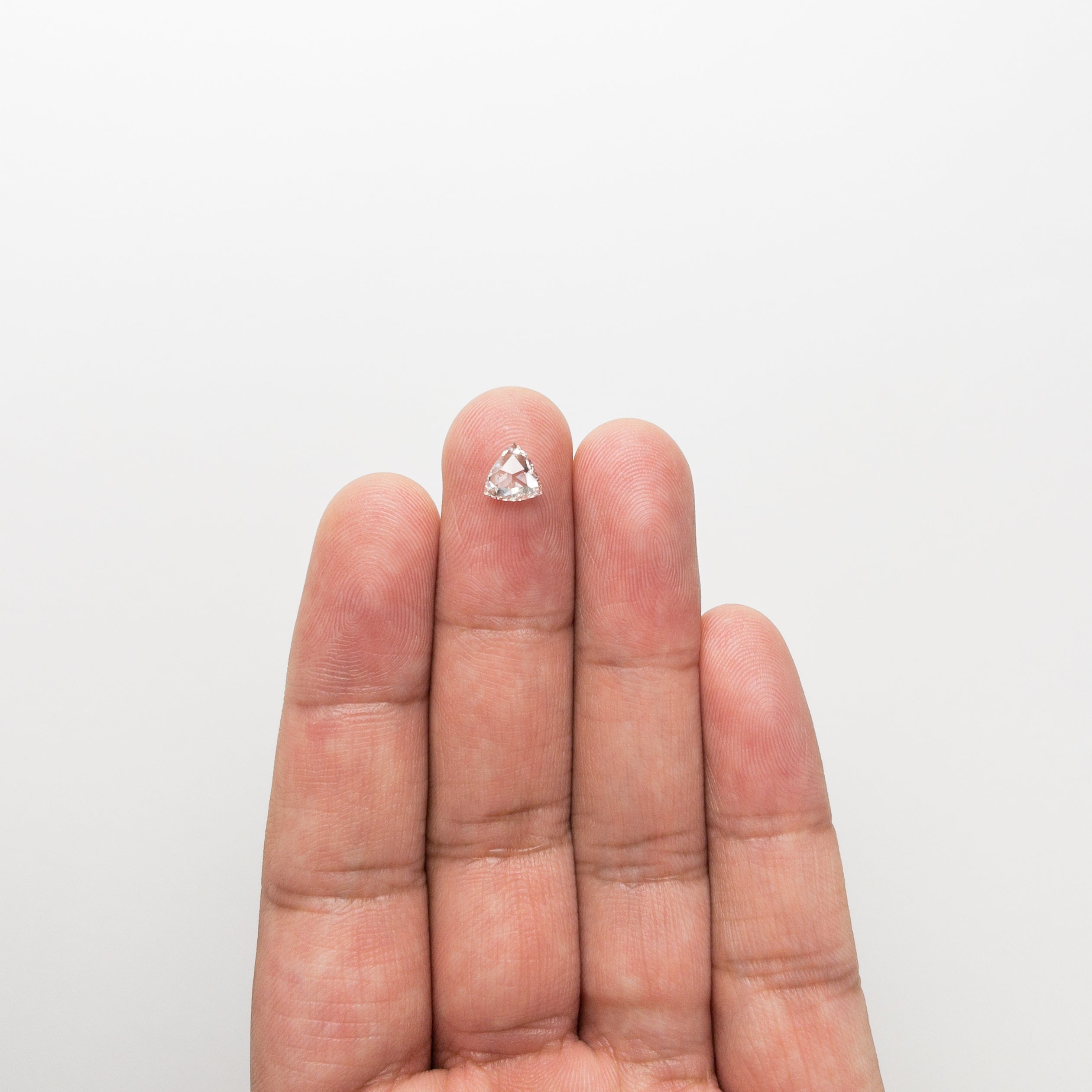 The 0.62ct 6.35x6.34x2.21mm SI1 G Trillion Rosecut 🇨🇦 21425-01 by East London jeweller Rachel Boston | Discover our collections of unique and timeless engagement rings, wedding rings, and modern fine jewellery.