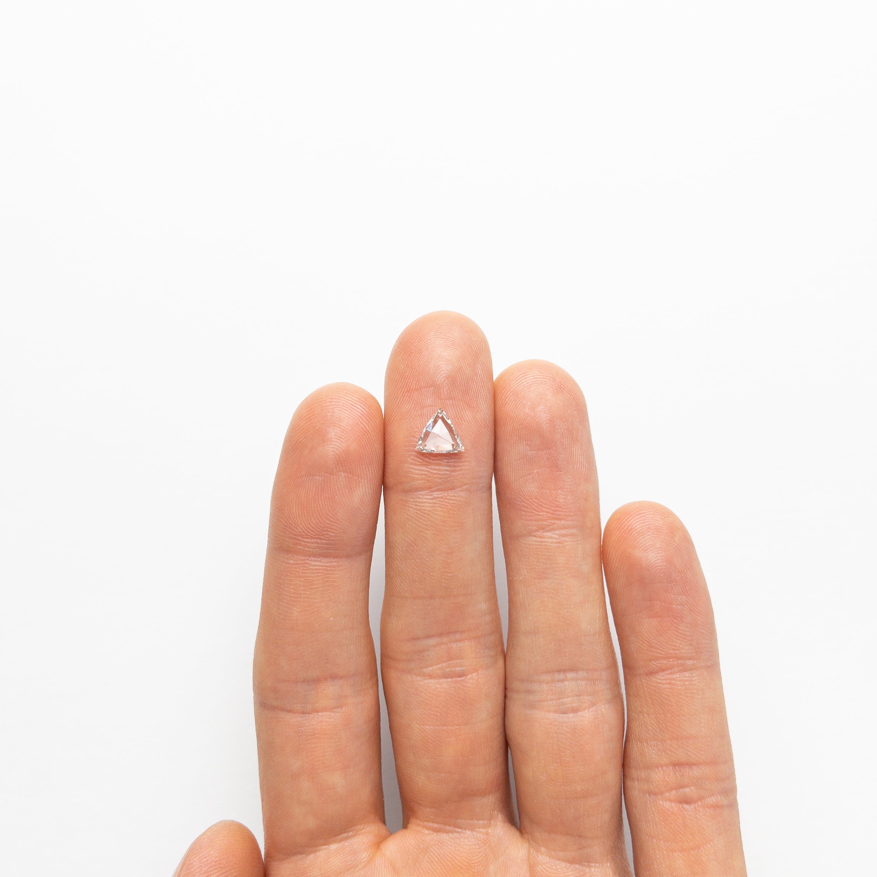 The 0.72ct 7.00x7.47x1.79mm VS2 G Trillion Rosecut 🇨🇦 21427-01 by East London jeweller Rachel Boston | Discover our collections of unique and timeless engagement rings, wedding rings, and modern fine jewellery.