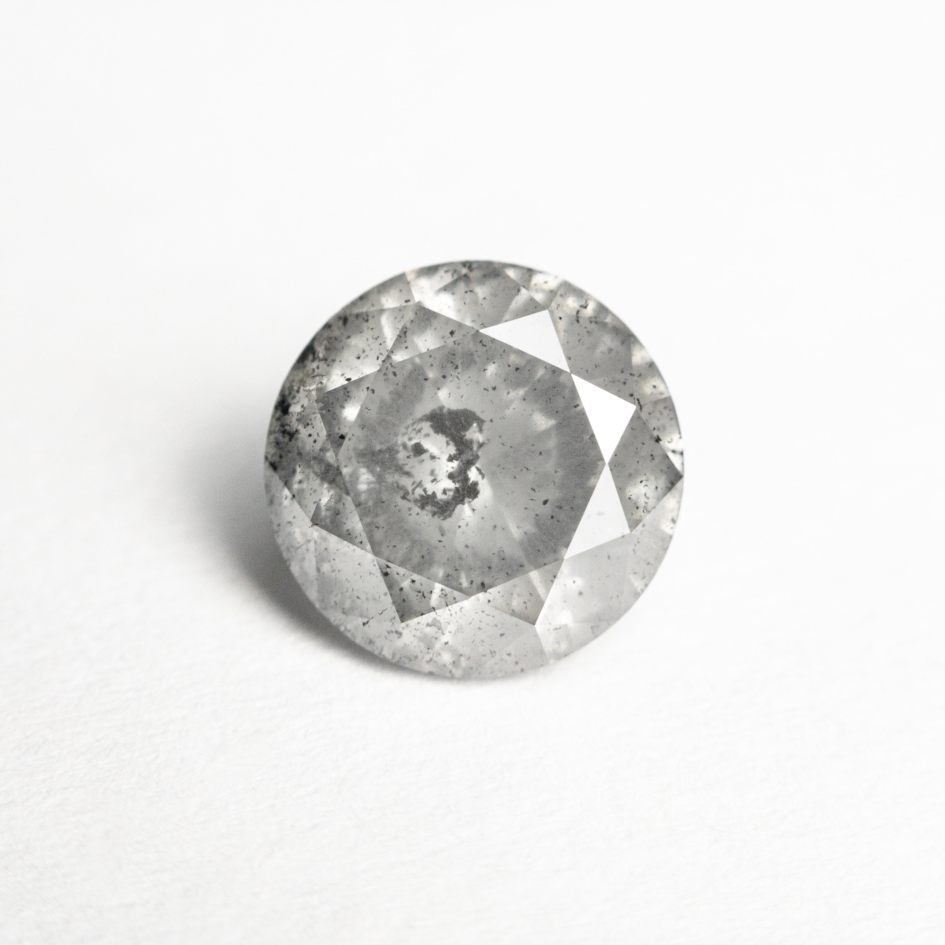 The 1.61ct 7.38x7.34x4.53mm Round Brilliant 21876-07 by East London jeweller Rachel Boston | Discover our collections of unique and timeless engagement rings, wedding rings, and modern fine jewellery.