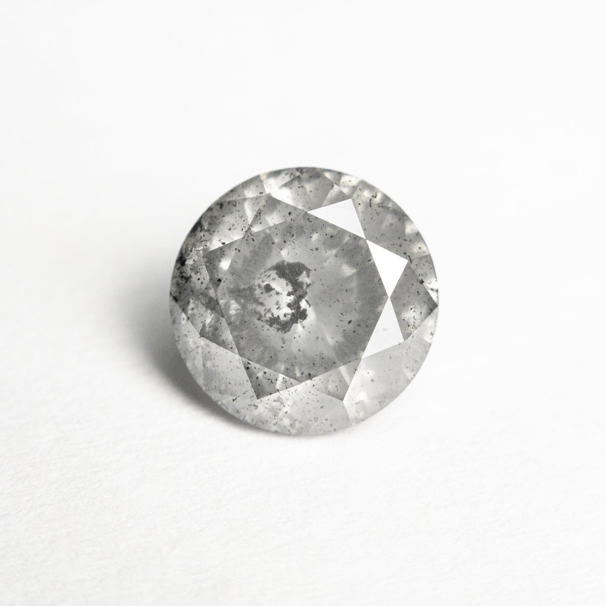 The 1.61ct 7.38x7.34x4.53mm Round Brilliant 21876-07 by East London jeweller Rachel Boston | Discover our collections of unique and timeless engagement rings, wedding rings, and modern fine jewellery.