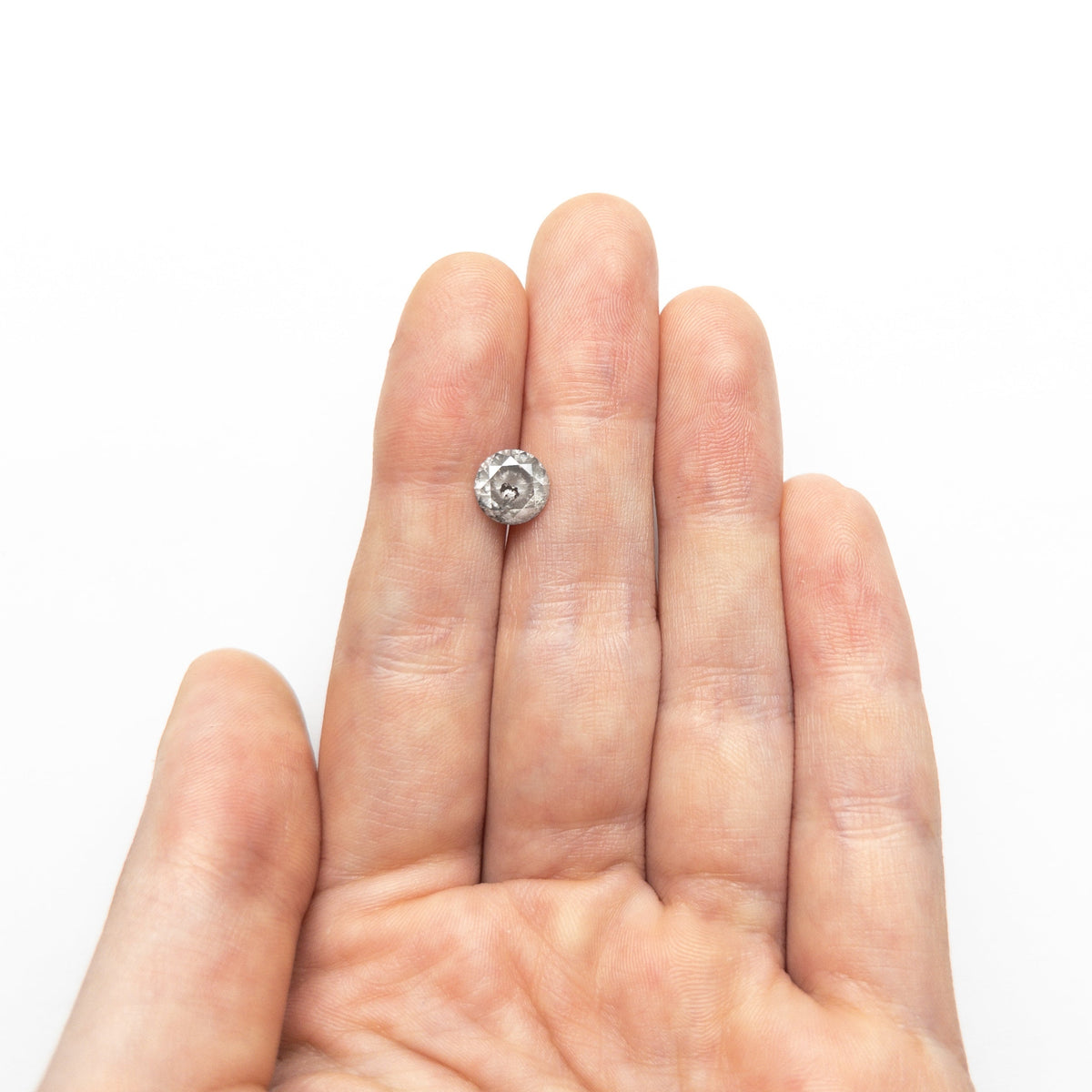 The 1.61ct 7.38x7.34x4.53mm Round Brilliant 21876-07 by East London jeweller Rachel Boston | Discover our collections of unique and timeless engagement rings, wedding rings, and modern fine jewellery.