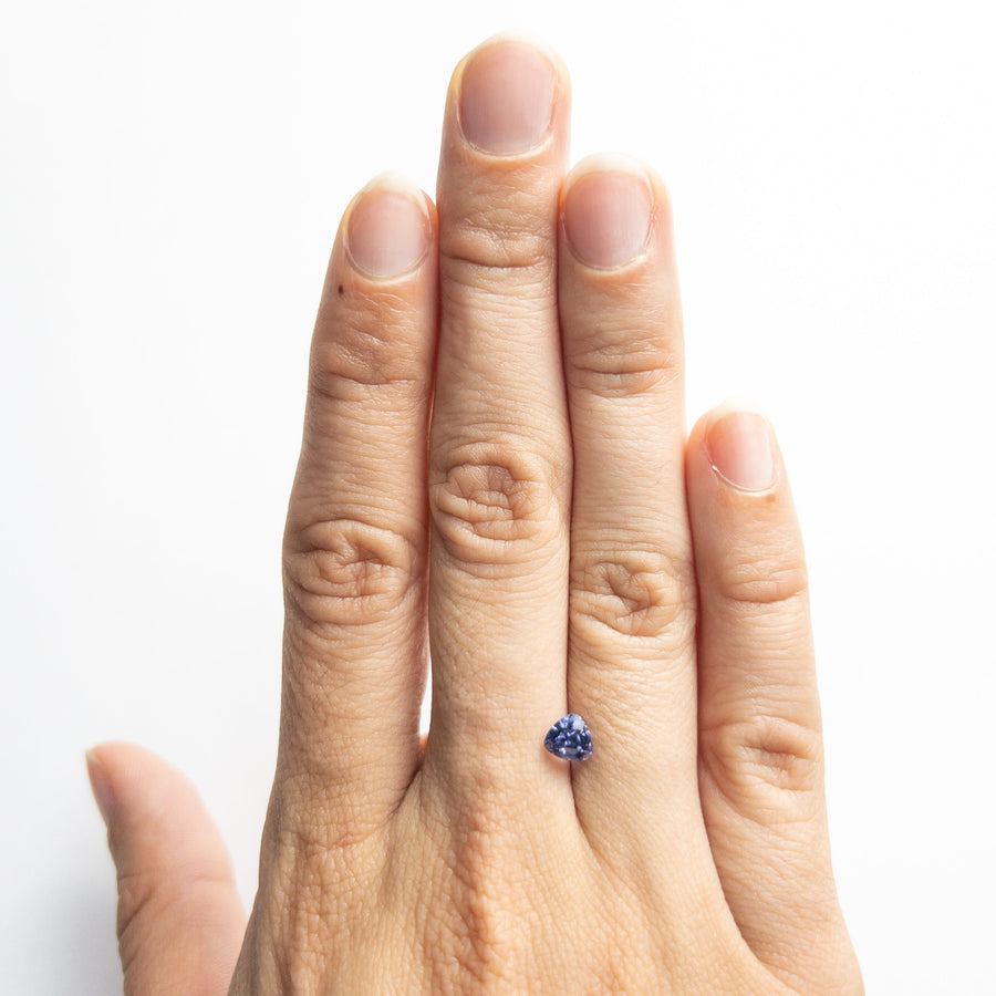 The 0.74ct 5.36x4.96x3.93mm Trillion Brilliant Sapphire 22319-01 by East London jeweller Rachel Boston | Discover our collections of unique and timeless engagement rings, wedding rings, and modern fine jewellery. - Rachel Boston Jewellery