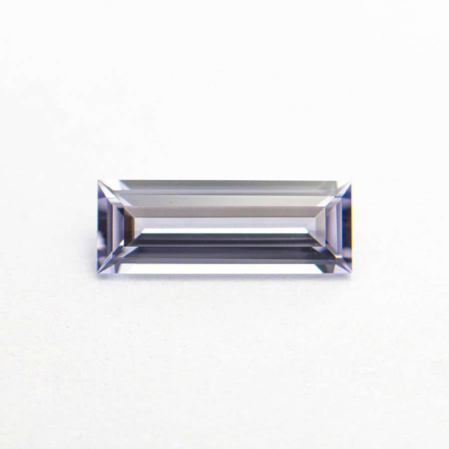 The 0.71ct 9.01x3.28x2.08mm Rectangle Step Cut Sapphire 22877-01 by East London jeweller Rachel Boston | Discover our collections of unique and timeless engagement rings, wedding rings, and modern fine jewellery. - Rachel Boston Jewellery
