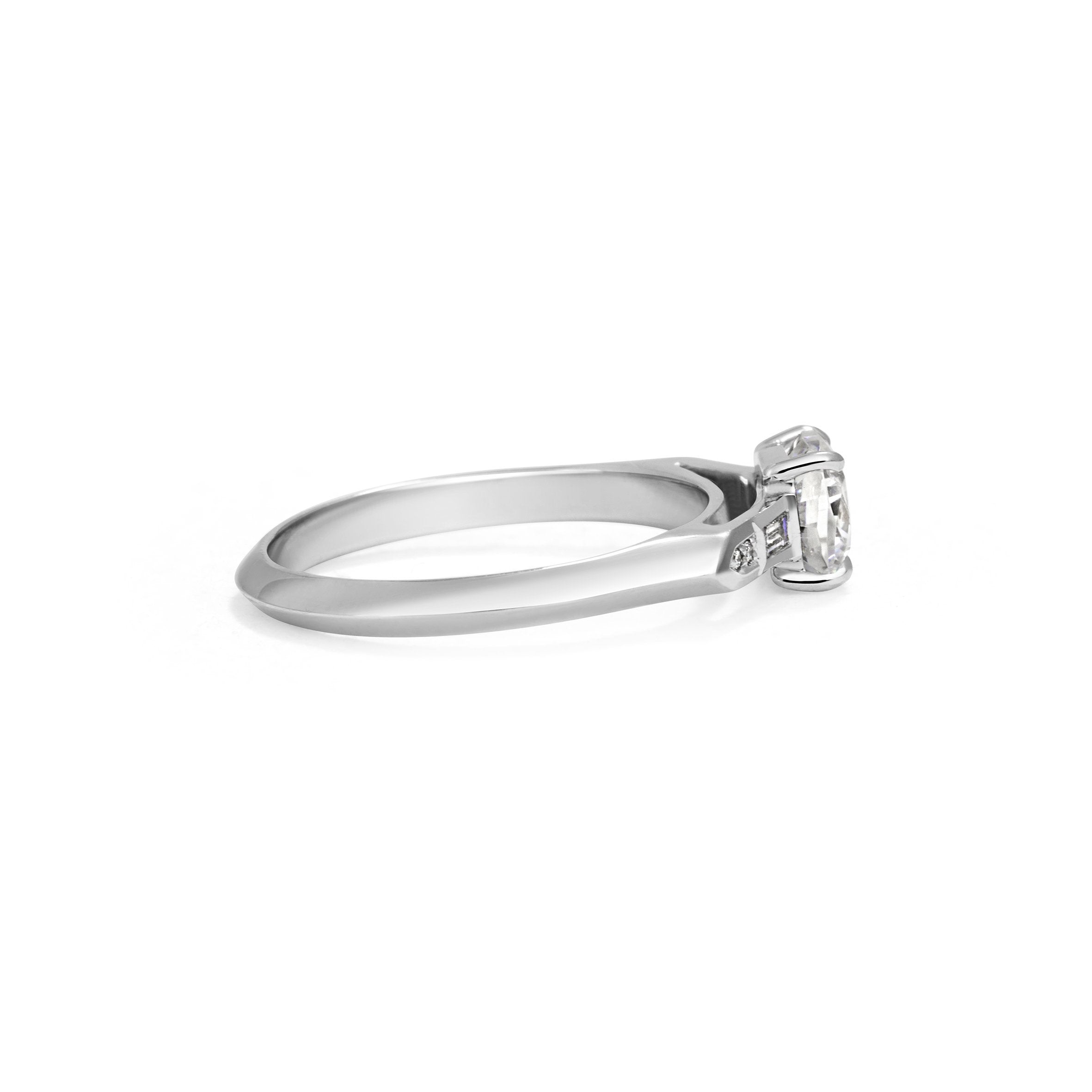 The Anita Ring by East London jeweller Rachel Boston | Discover our collections of unique and timeless engagement rings, wedding rings, and modern fine jewellery.