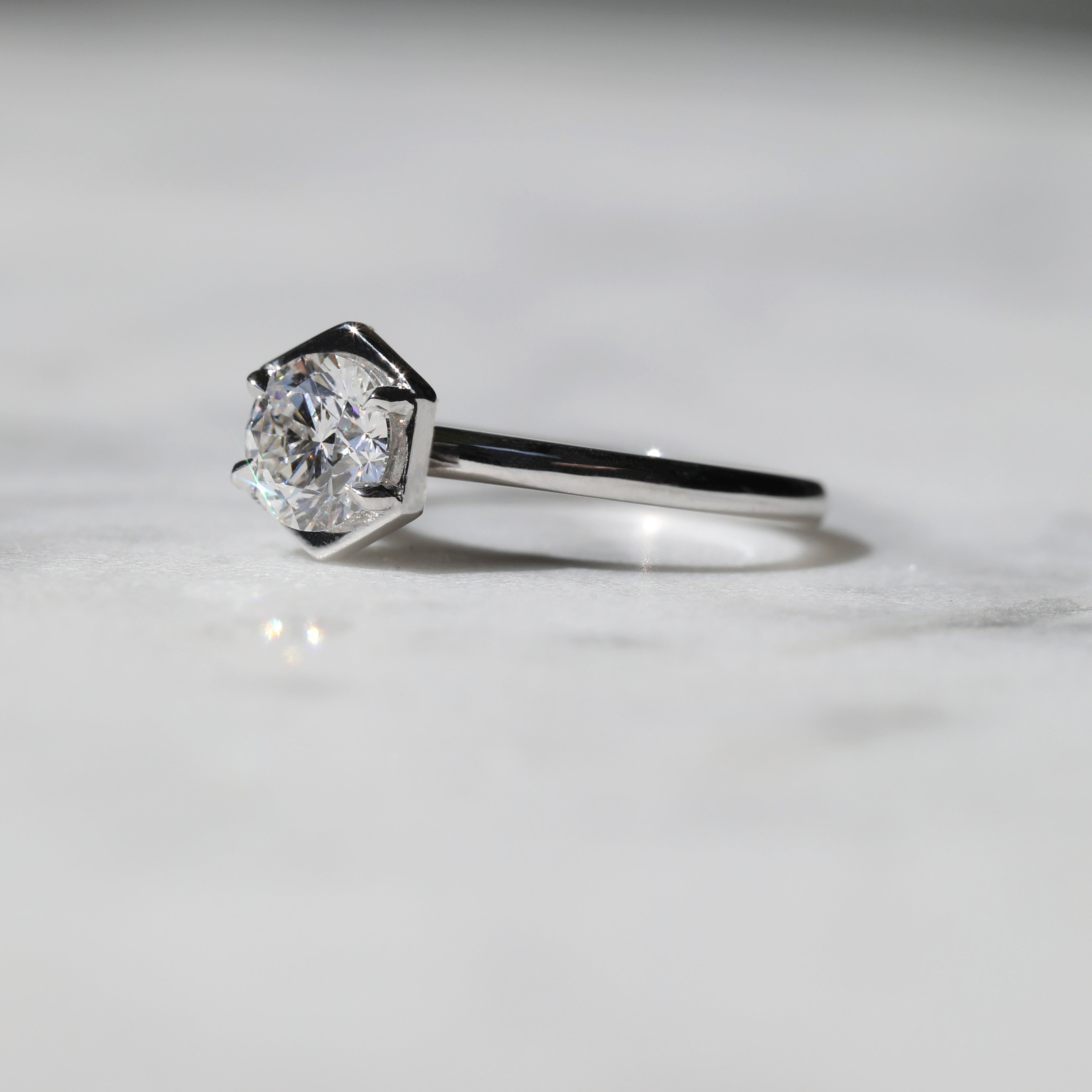 The Aquila Ring by East London jeweller Rachel Boston | Discover our collections of unique and timeless engagement rings, wedding rings, and modern fine jewellery.