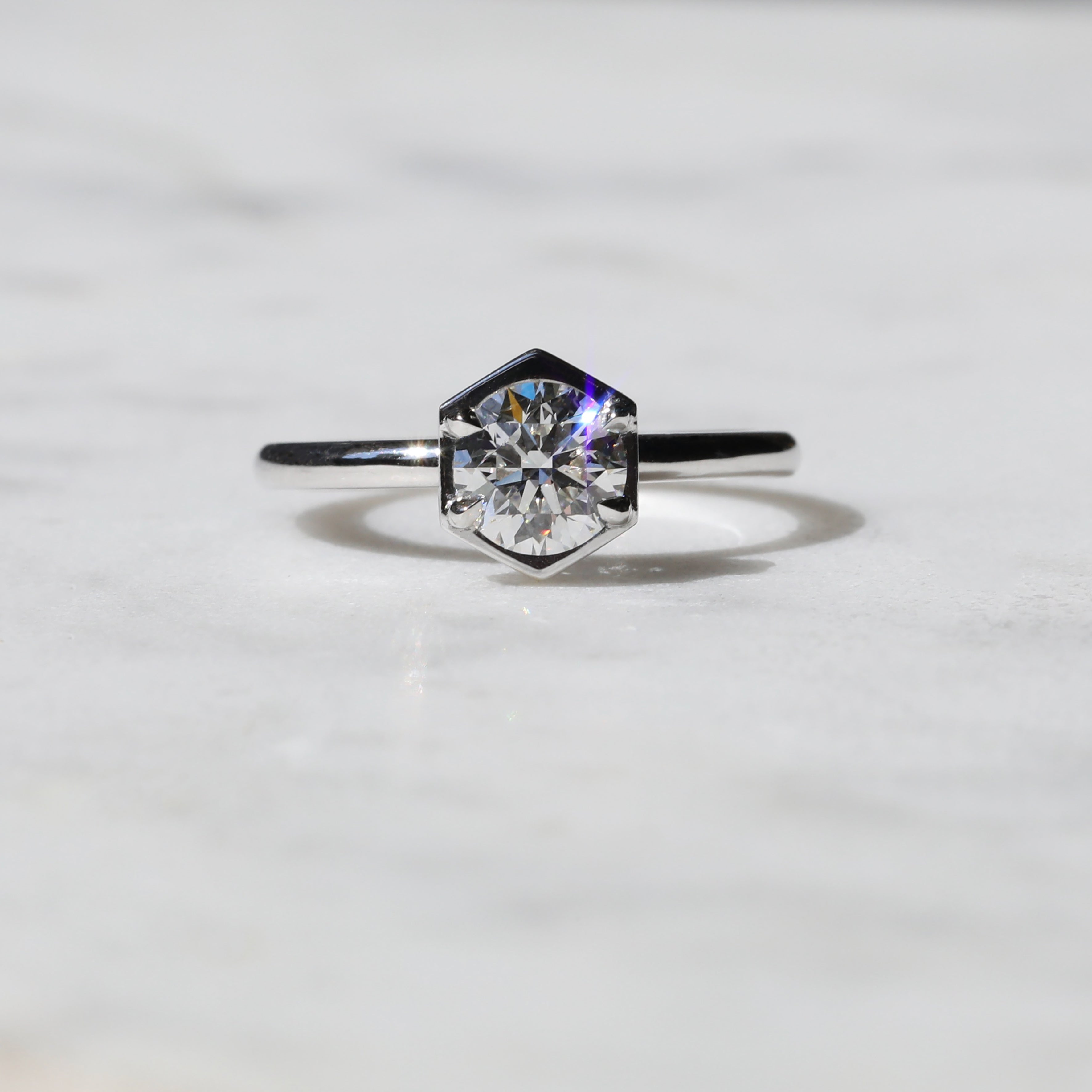 The Aquila Ring by East London jeweller Rachel Boston | Discover our collections of unique and timeless engagement rings, wedding rings, and modern fine jewellery.